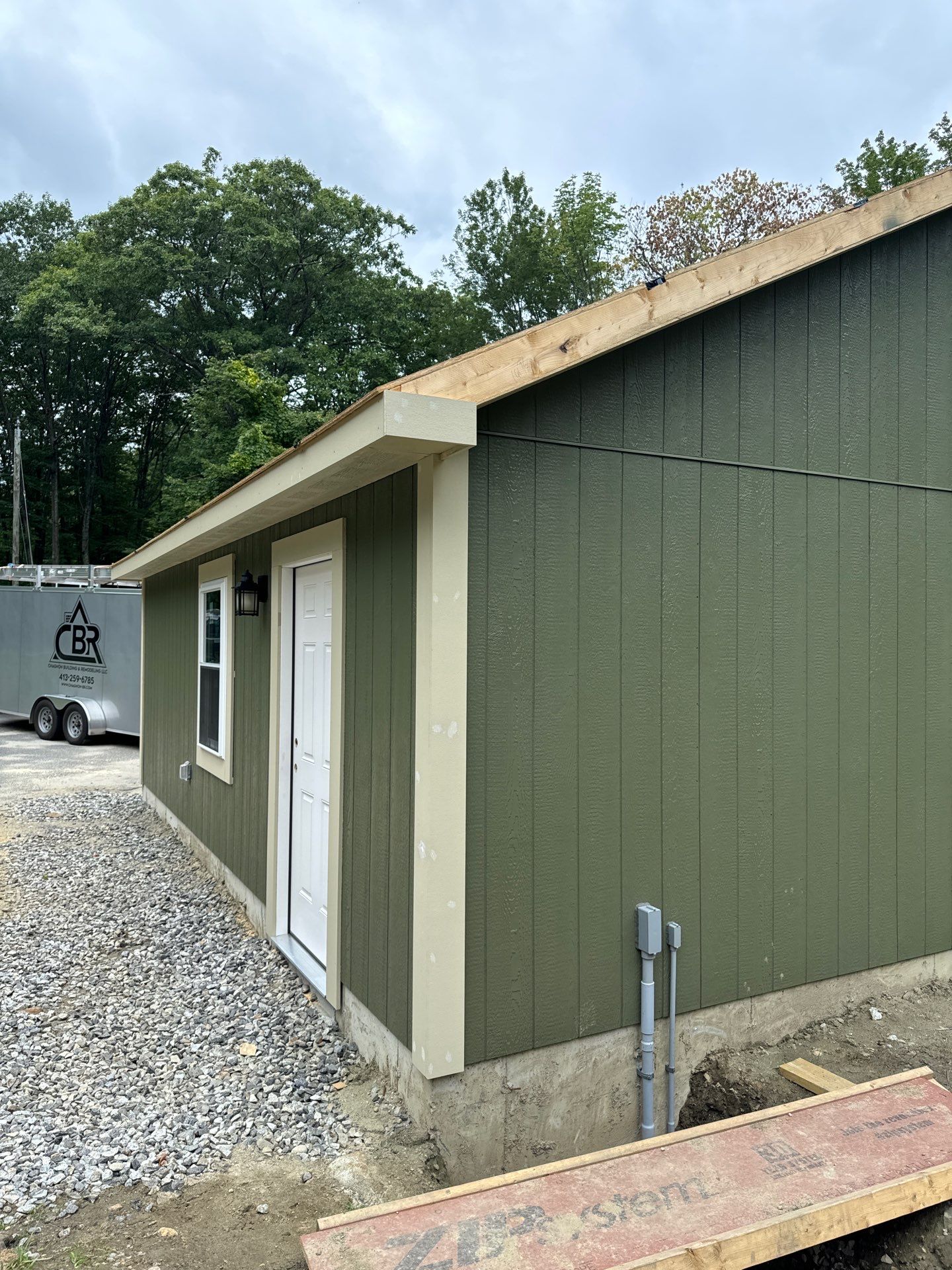 Two-Car Garage using LP SmartSide Panel Siding by Chagnon Building & Remodeling LLC