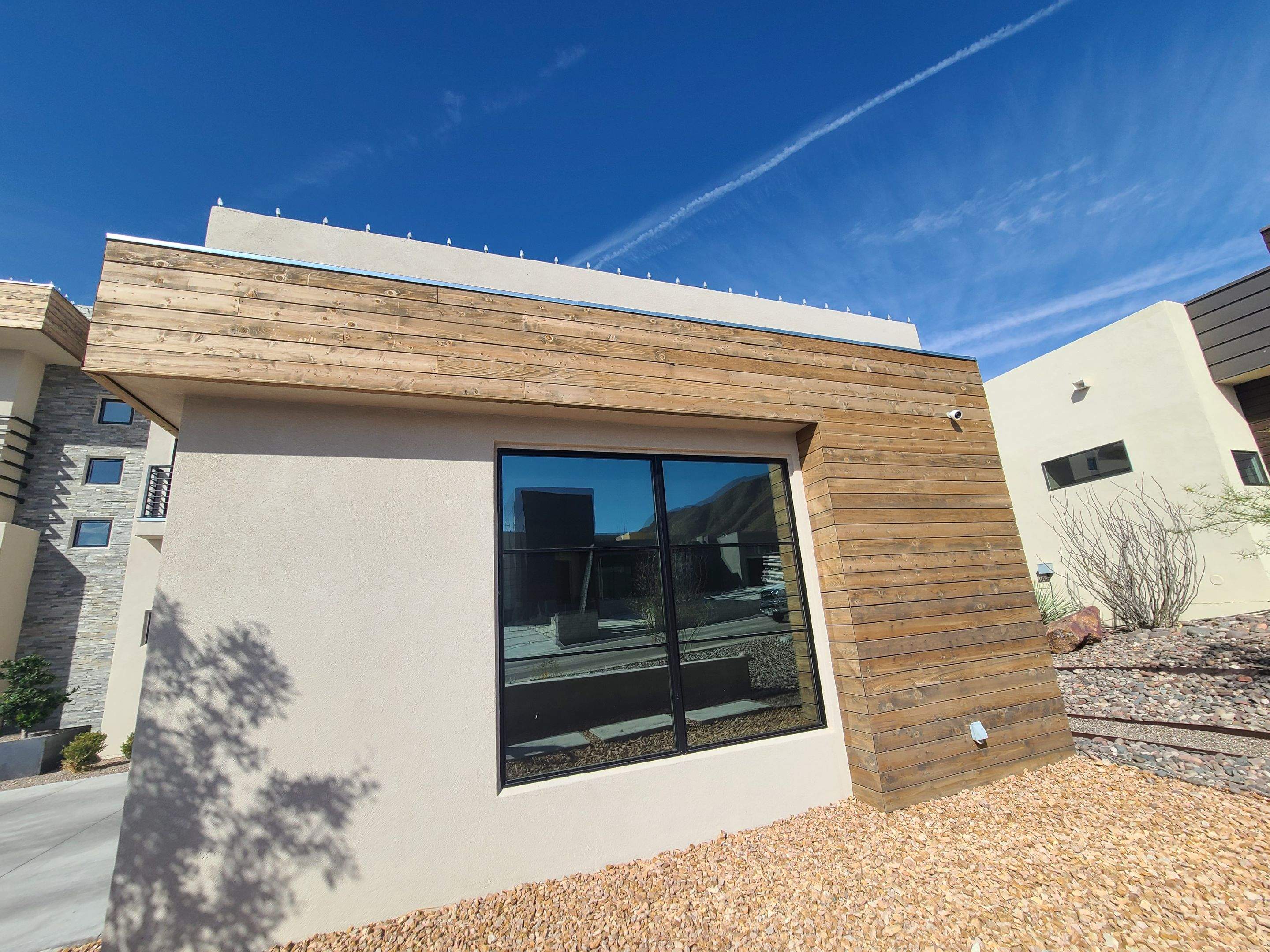 Exterior Wood Staining and Composite Decking Installation by Regal Renovate