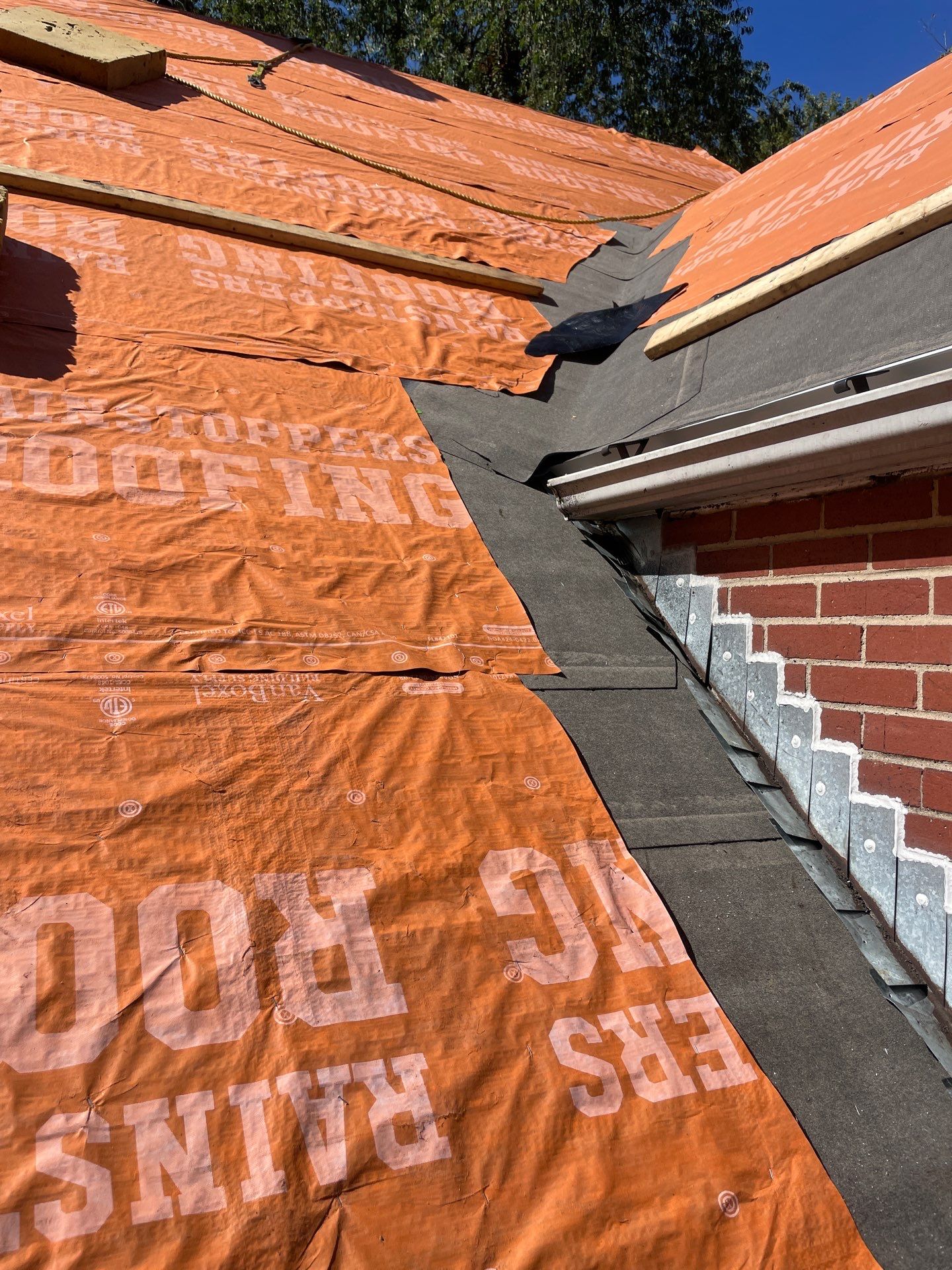 Residential Roofing Installation using GAF Timberline HDZ Weathered Wood by Rainstoppers Roofing