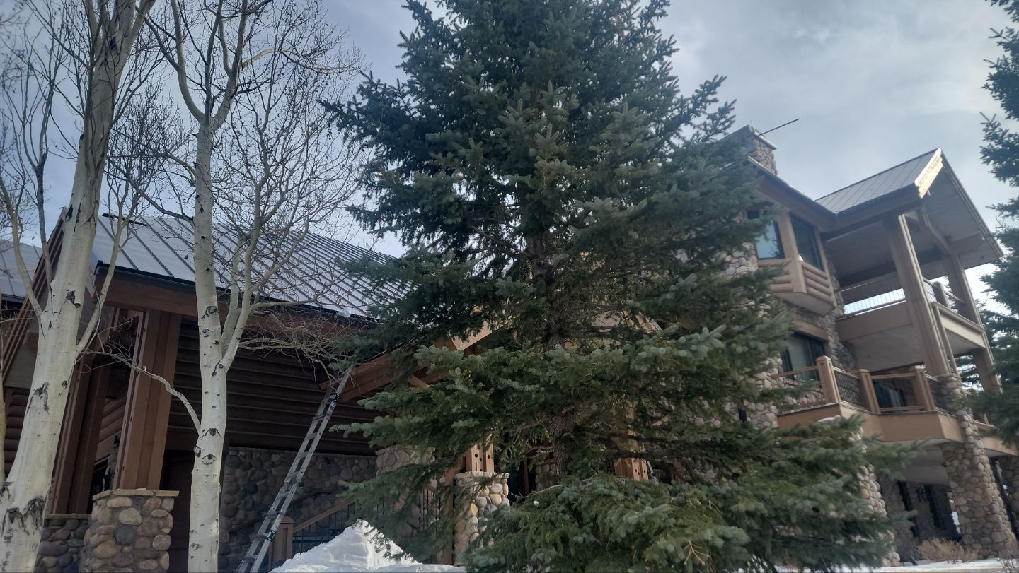 Standing Seam Metal Roof Replacement After Snow Damage by ASAP Roofing & Restoration