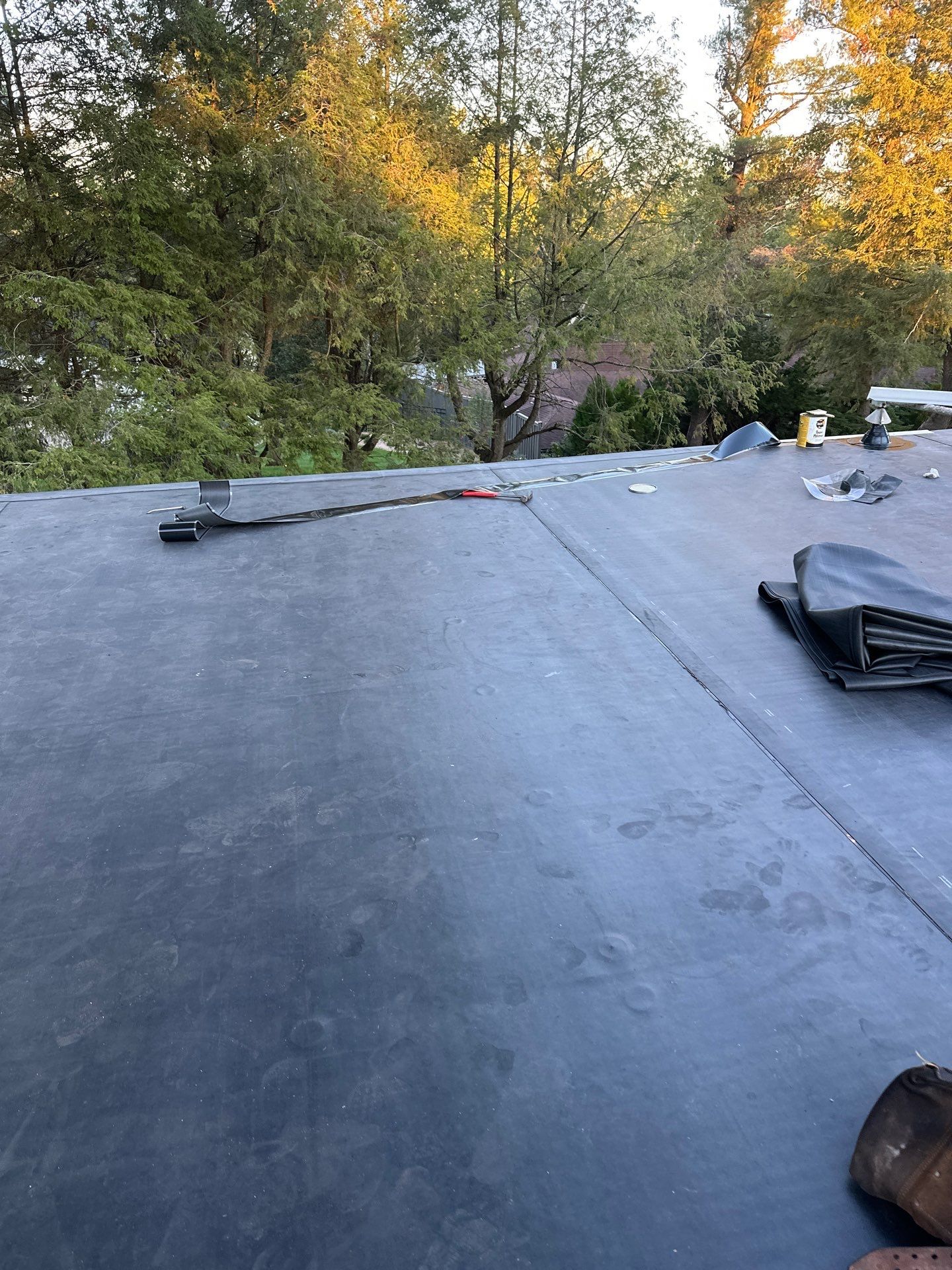 Residential Roofing Installation using EPDM  by Rainstoppers Roofing