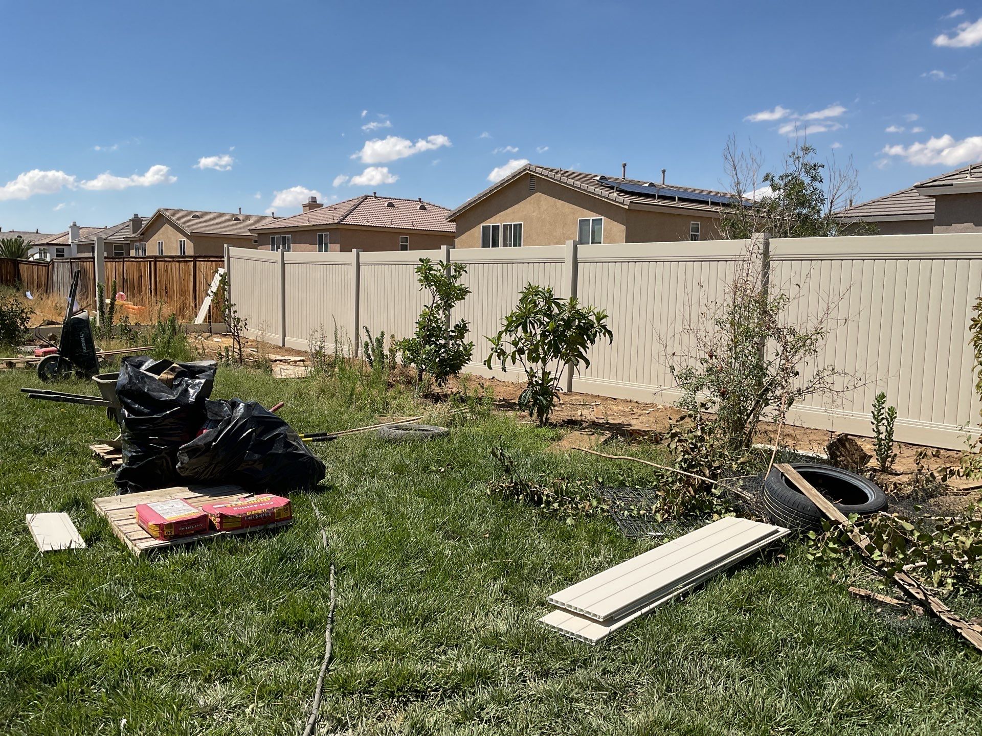 Tan Vinyl by Fence Guys Inc. 