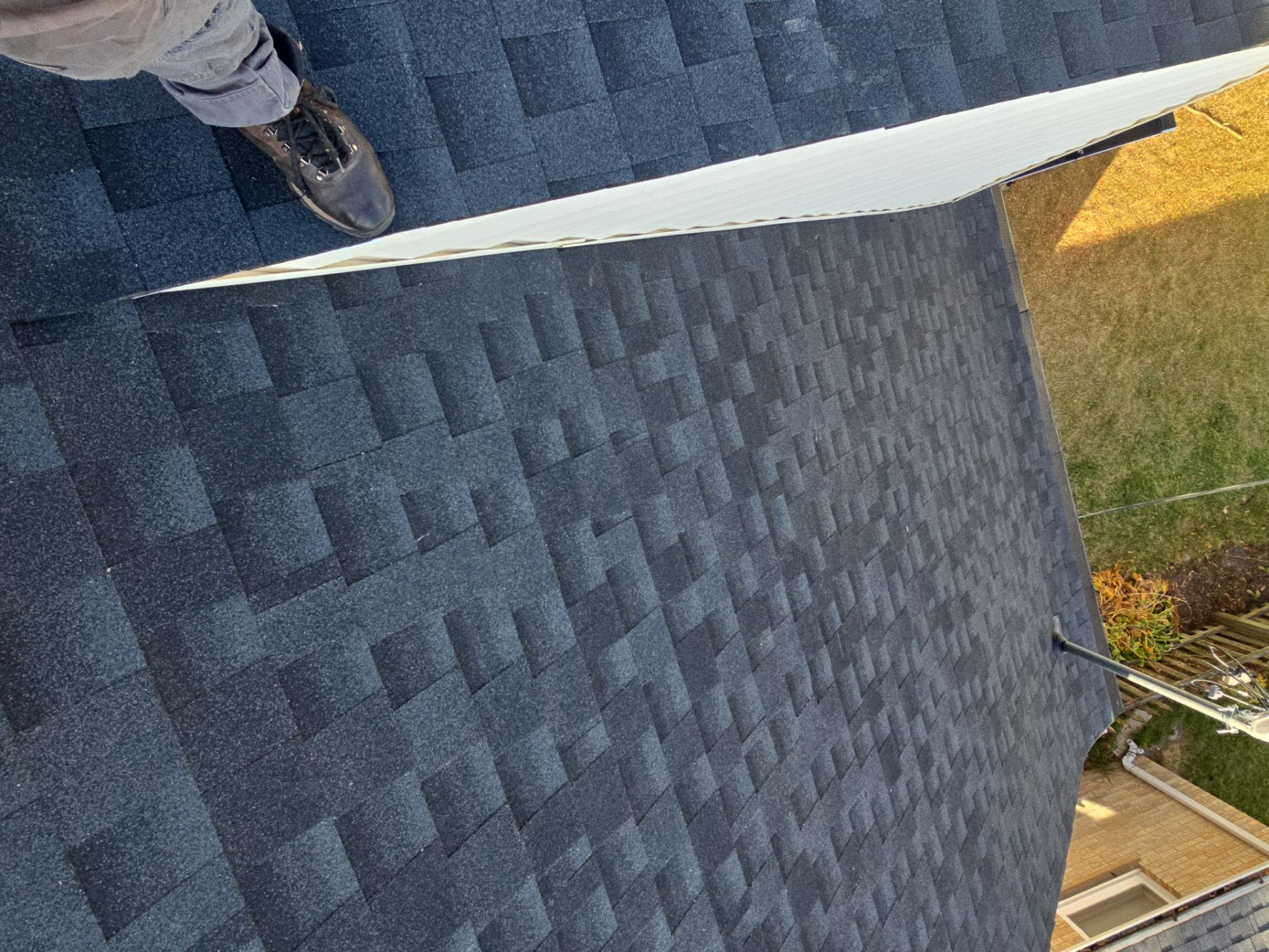 House, Garage, and Skylight Roof Replacement with GAF HDZ Charcoal Shingles and Gutter Protection by Gellings Roofing & Siding