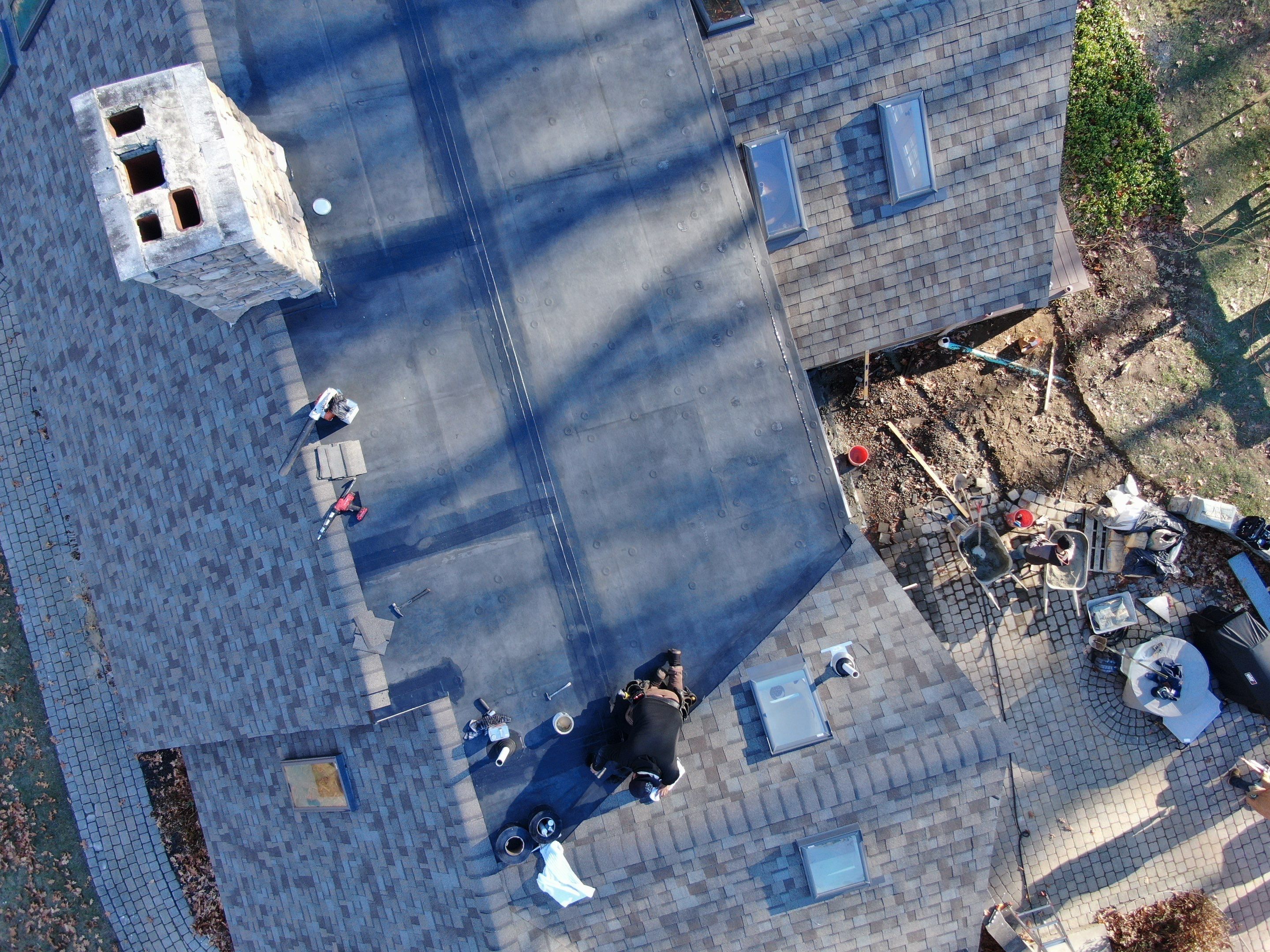 Complete House & Barn Roof with 13 Skylight Reflashing + EPDM Repairs by Mighty Dog Roofing of Greater Middlesex County