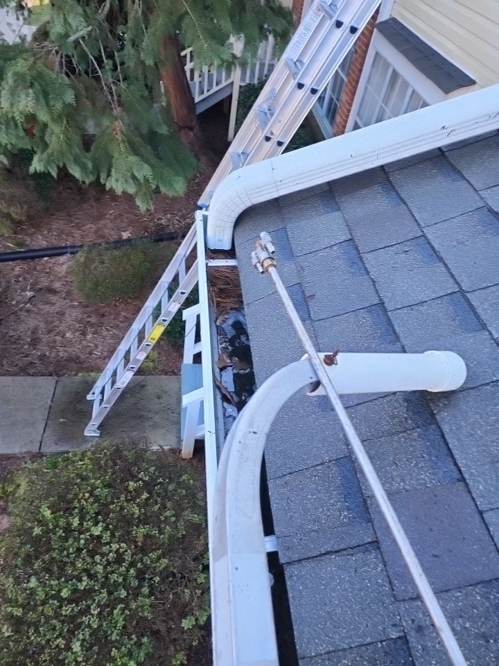 Gutter Cleaning using water by Power Wash Masters LLC