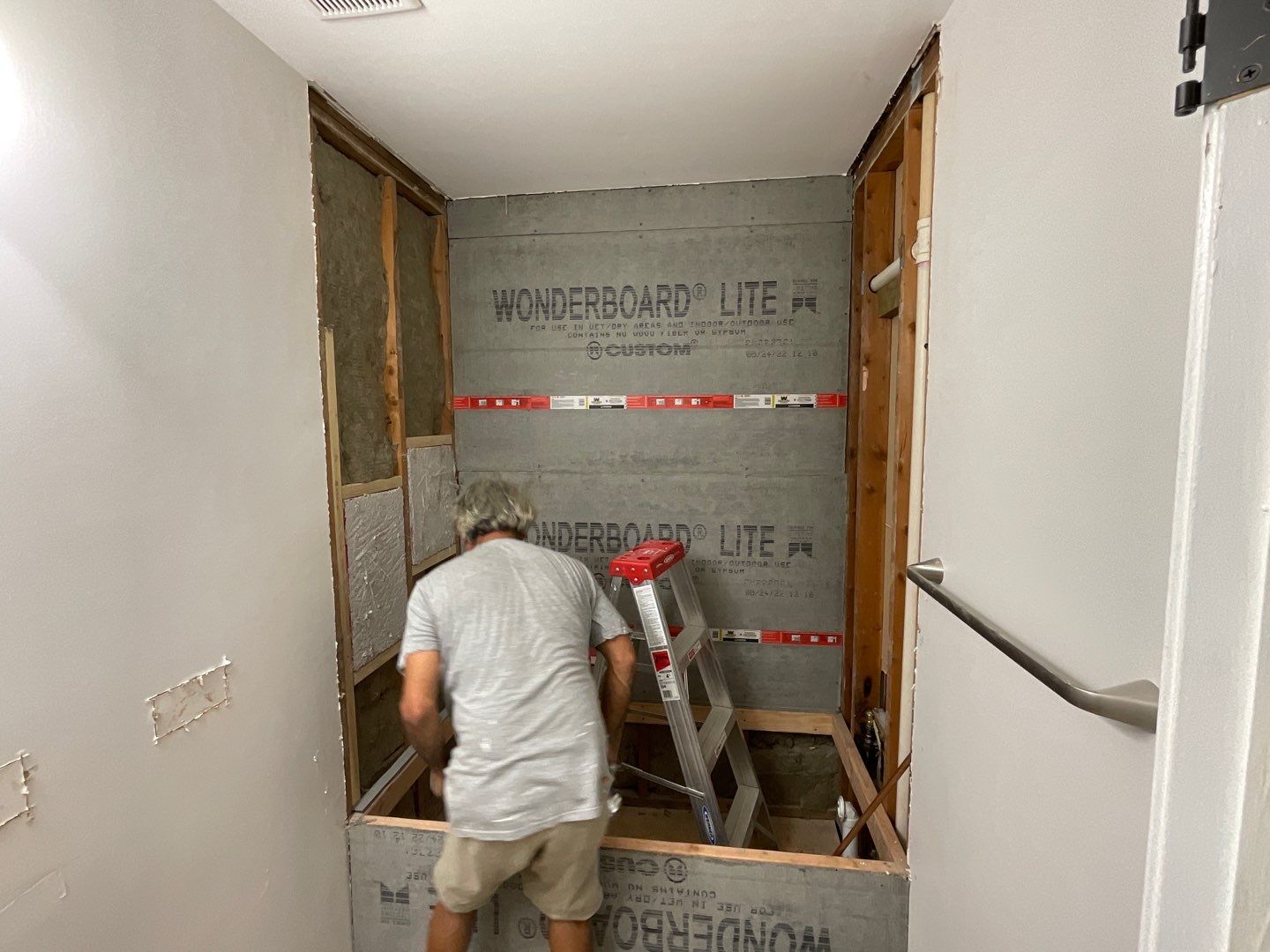 Bathroom Remodel using Two new bathroom design and new floors by Alpha Design Services