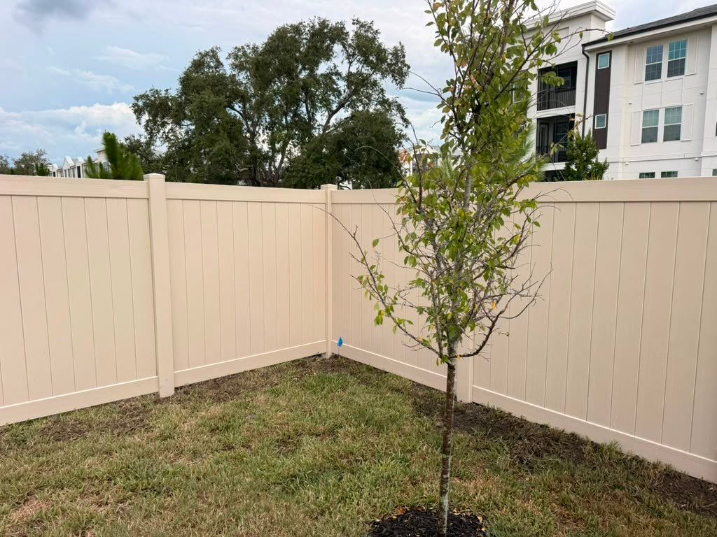 Tan Vinyl Privacy Fence Installation for Sarasota Home by True Fence LLC