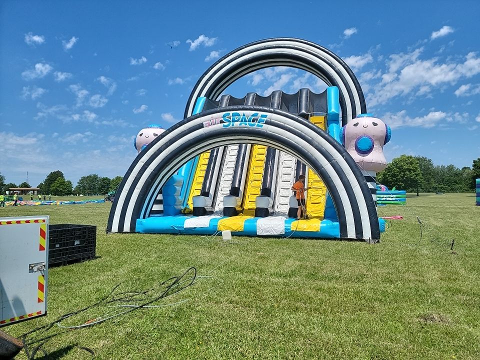 Cleaning for big bounce america prior to a large event by Northern Power Washing LLC.