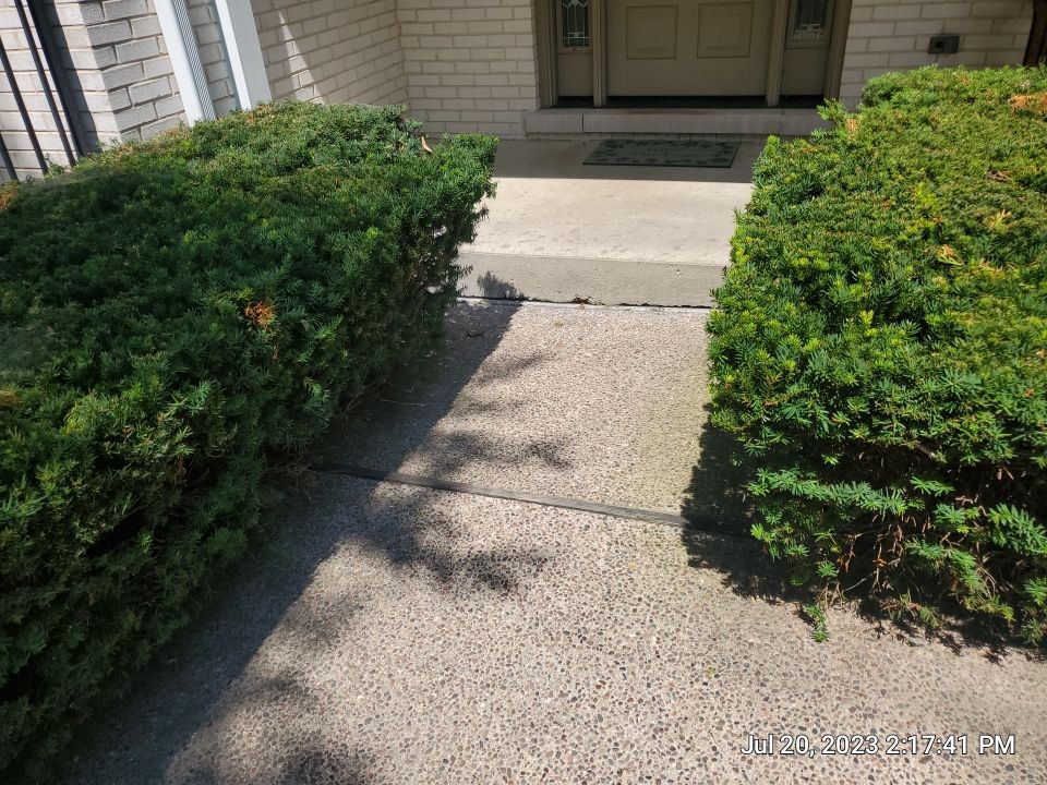 Aggregate concrete cleaning and sealing using Surebond SB-9000 by Northern Power Washing LLC.