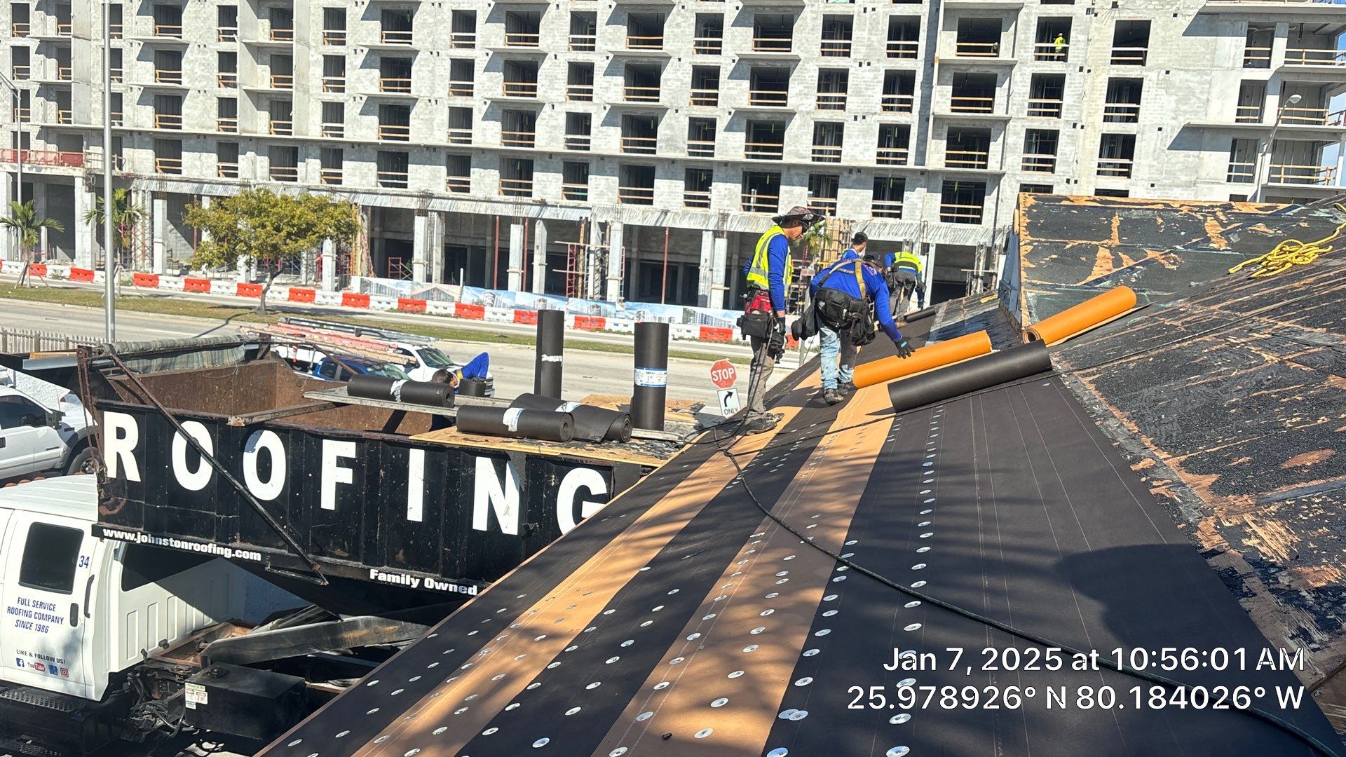 COMMERCIAL REROOF 24 GUAGE MEDIUM BRONZE 1-1/2" MECHANICAL SEAM "ZEBRA METHOD" by Earl W. Johnston Roofing LLC