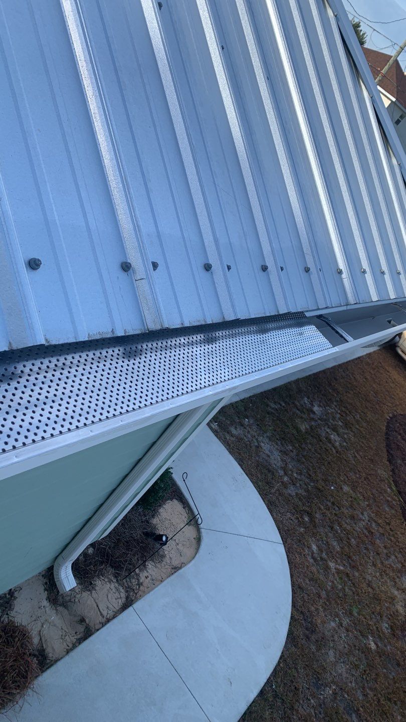 Seamless Gutter Installation Using K-Style Gutters And Gutter Guards by Gutter Professors