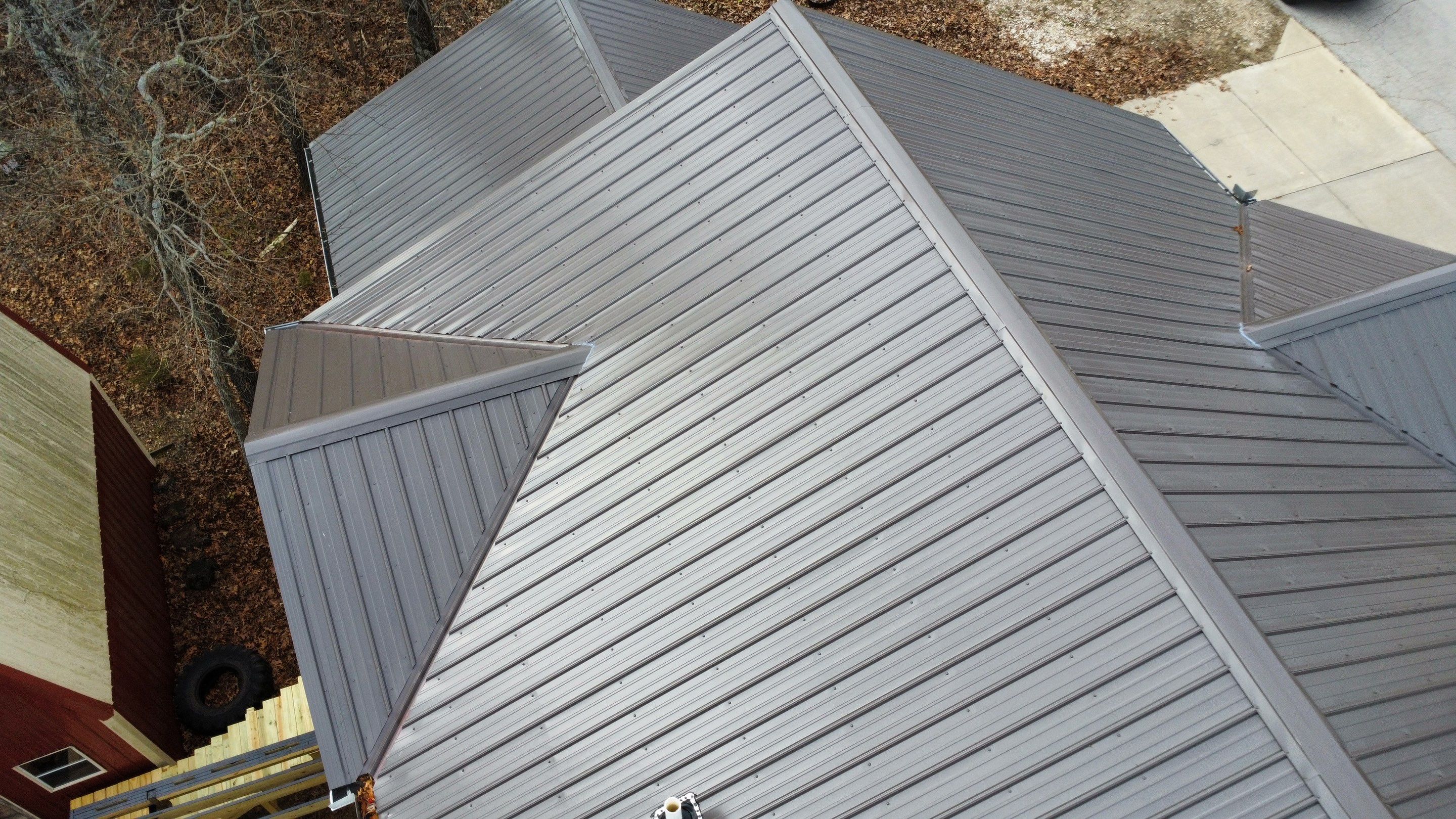 Residential Roofing Install - 29 Gauge G-Rib Metal - Color Burnished Slate  by Titan Commercial & Residential Roofing 