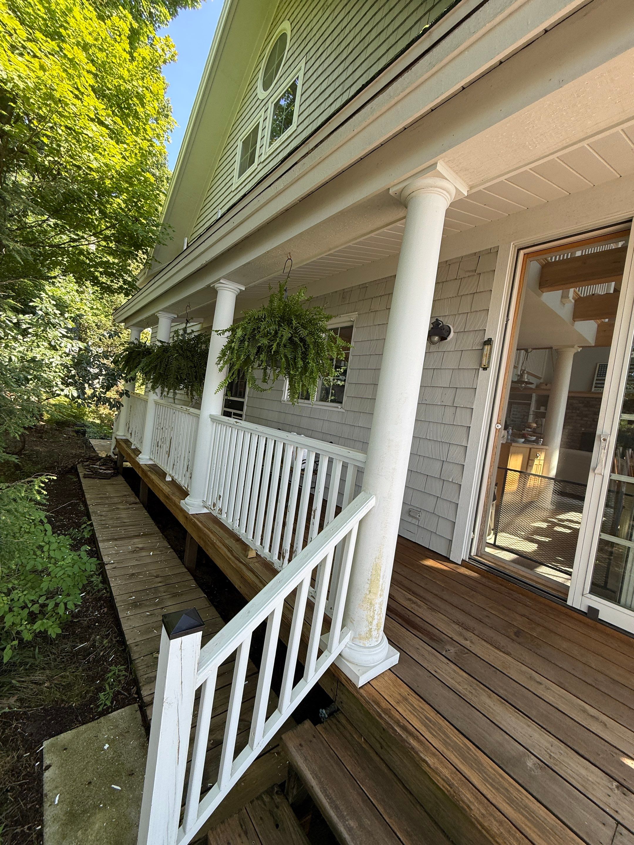 Lakefront Deck Pressure Washing, Exterior Wood Staining, and Painting in West Olive MI by Gordon Painting