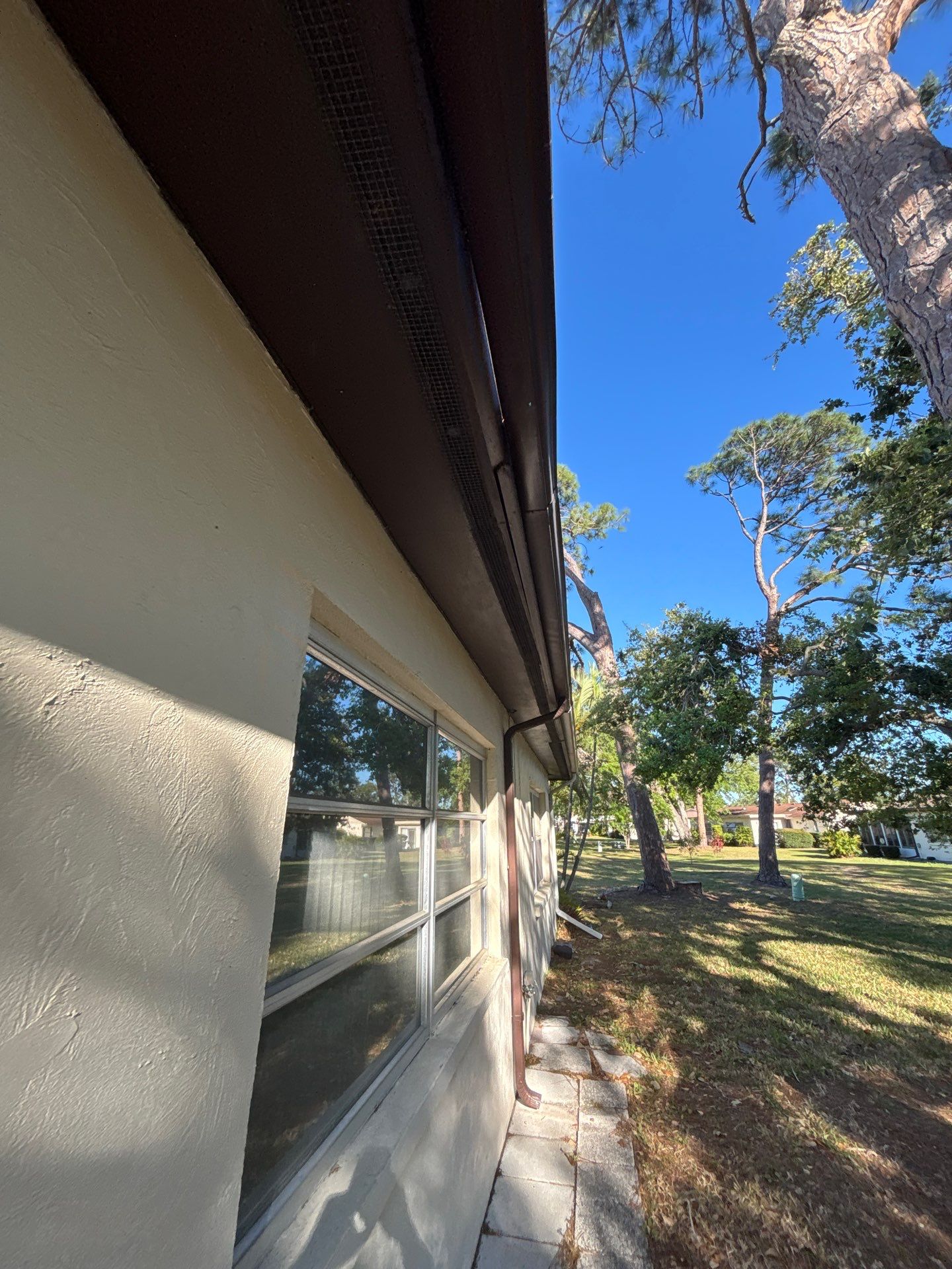 6 Inch Seamless Gutters using Musket Brown Seamless Gutters in Sarasota FL by Gutter Professors