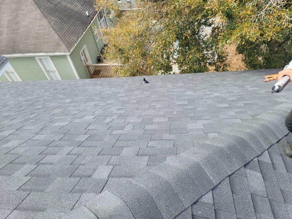Residential Roofing Installation using Roof Replacement by American Roofing & Construction LLC