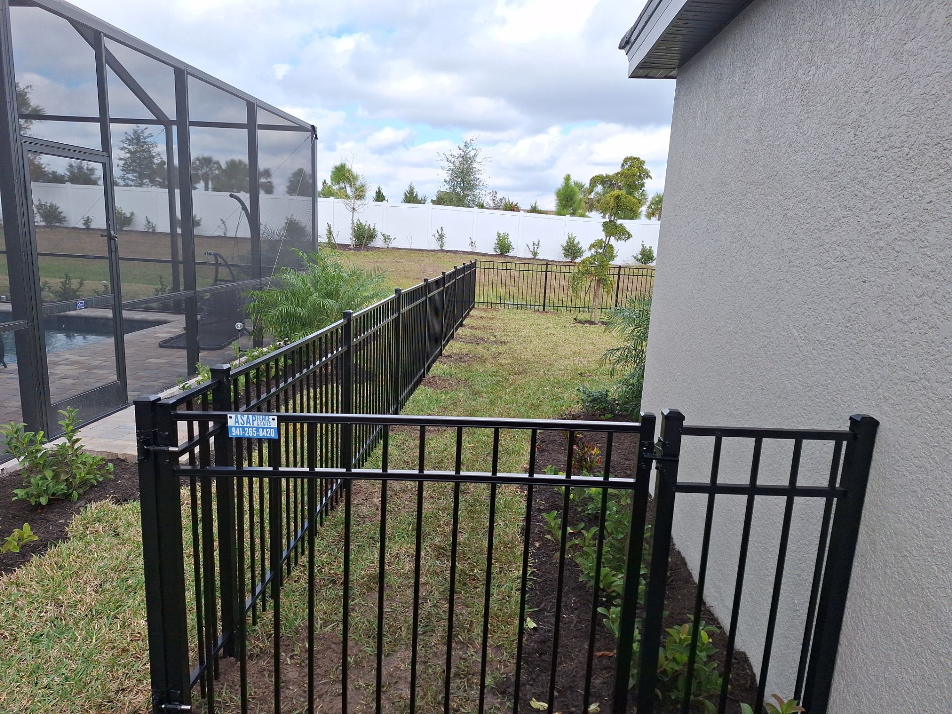 Aluminum Fence Installation using 4ft 3 Rail Black Aluminum Fence by Asap fence and gates, LLC