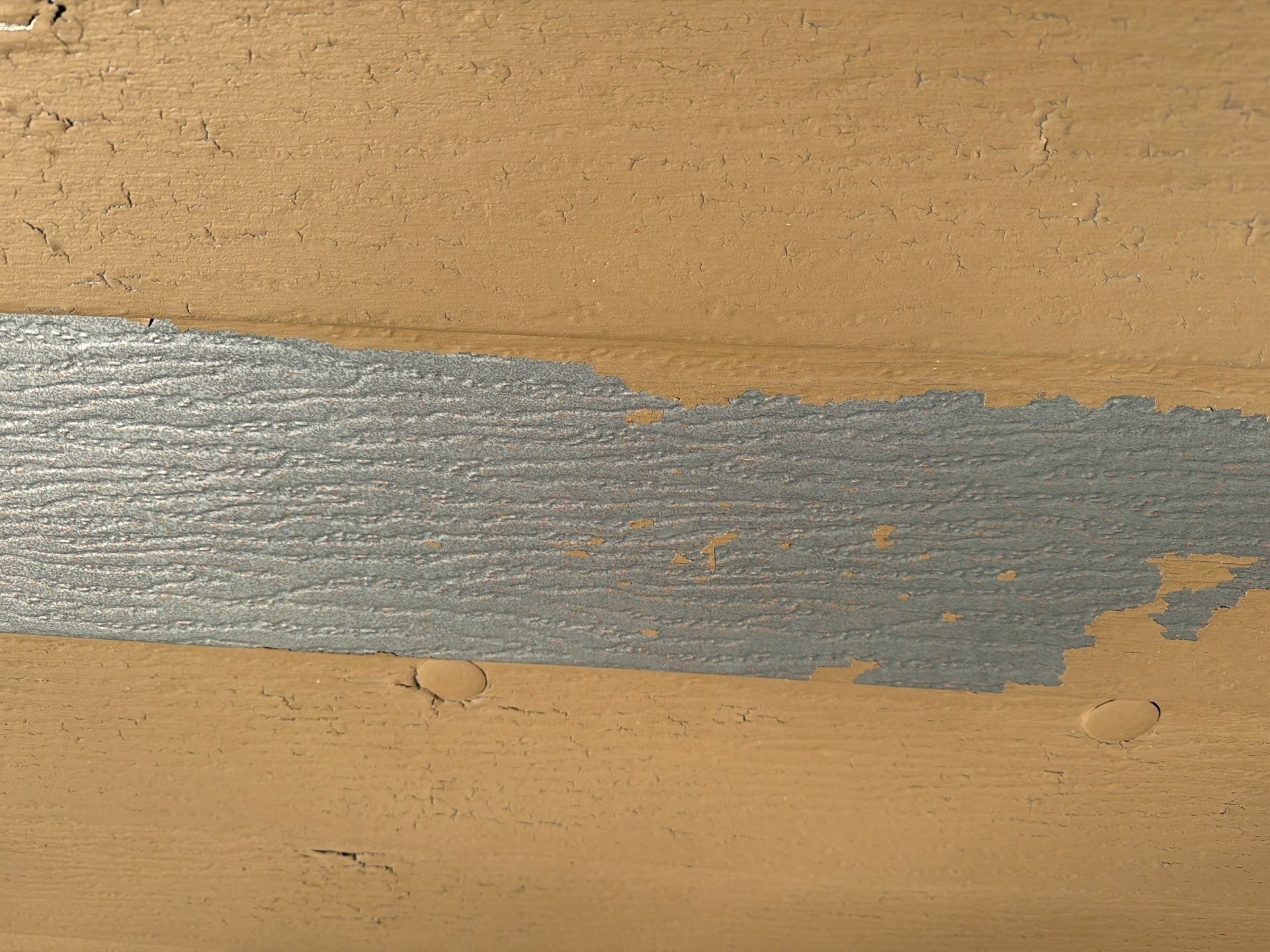 Exterior Siding Repair and Full House Repaint in Sioux Falls by Select Painting, Coatings & Garage Cabinets