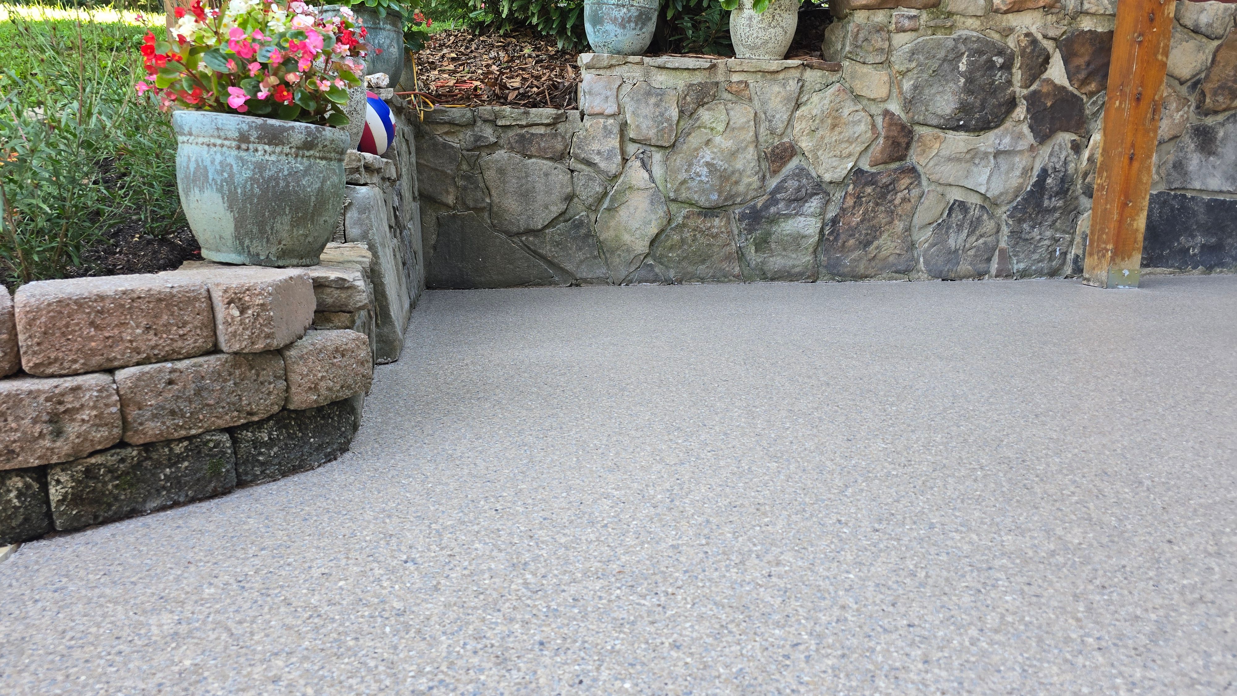 Back Patio using Obsidian by Elite Floor Solutions
