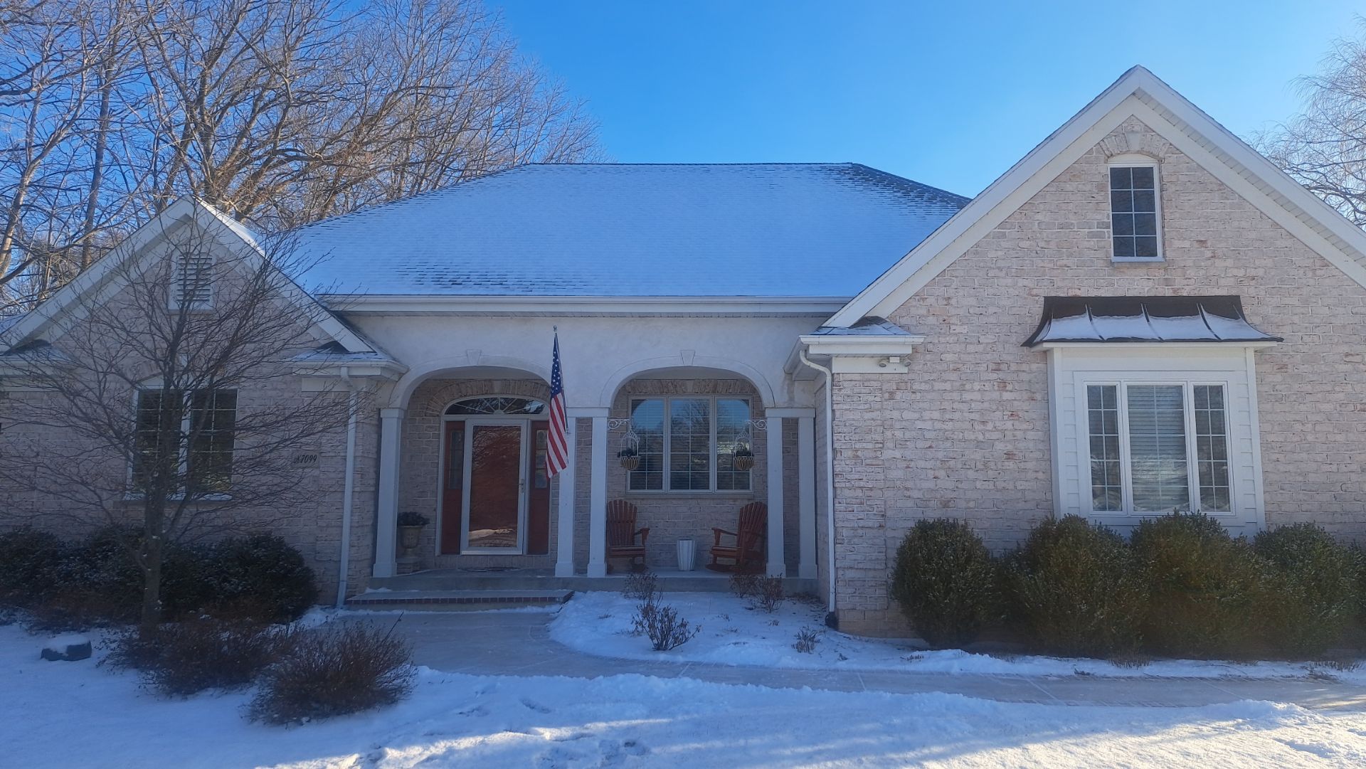 Classic Stucco Beauty  by Gellings Roofing & Siding