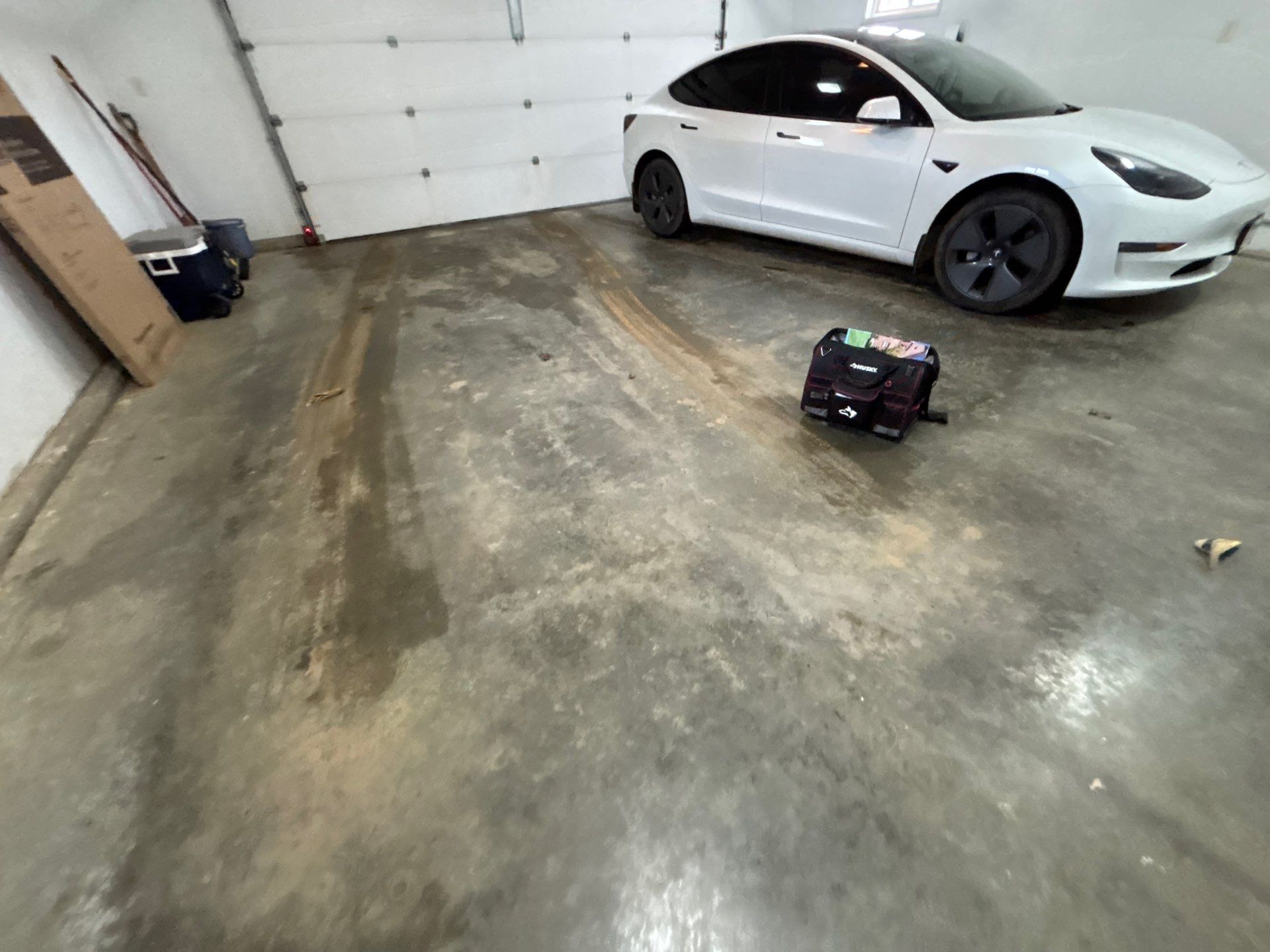 Full Garage Floor and Basement Stair Epoxy Coating in Sioux Falls by Select Painting, Coatings & Garage Cabinets