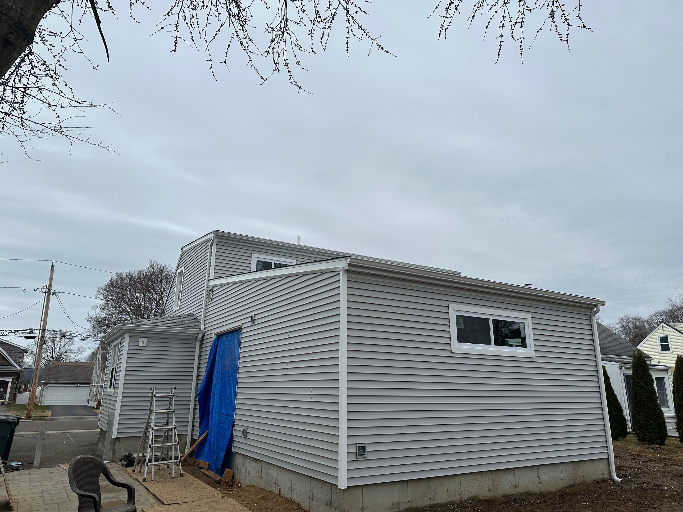 Siding Installation using CertainTeed Monogram Vinyl Siding - D4 - Sterling Gray by A Plus Exterior