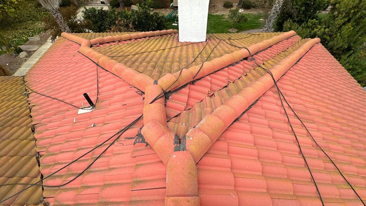 Tile refurbish project using existing tiles and replaced underlayment and battens by Straight Edge Roofing Inc