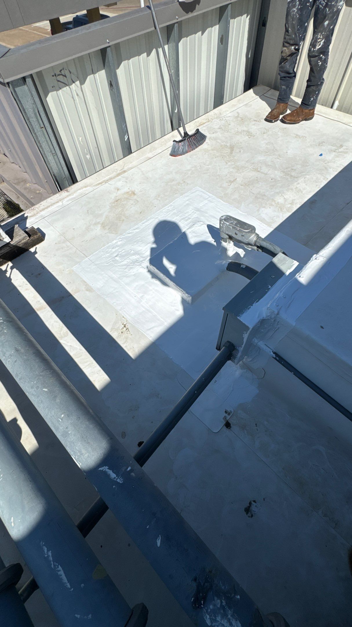 Commercial Roofing Repair using TRP #924 Eterna-Sil Premium Silicone Roof Coating by Harvey Roofing & Construction