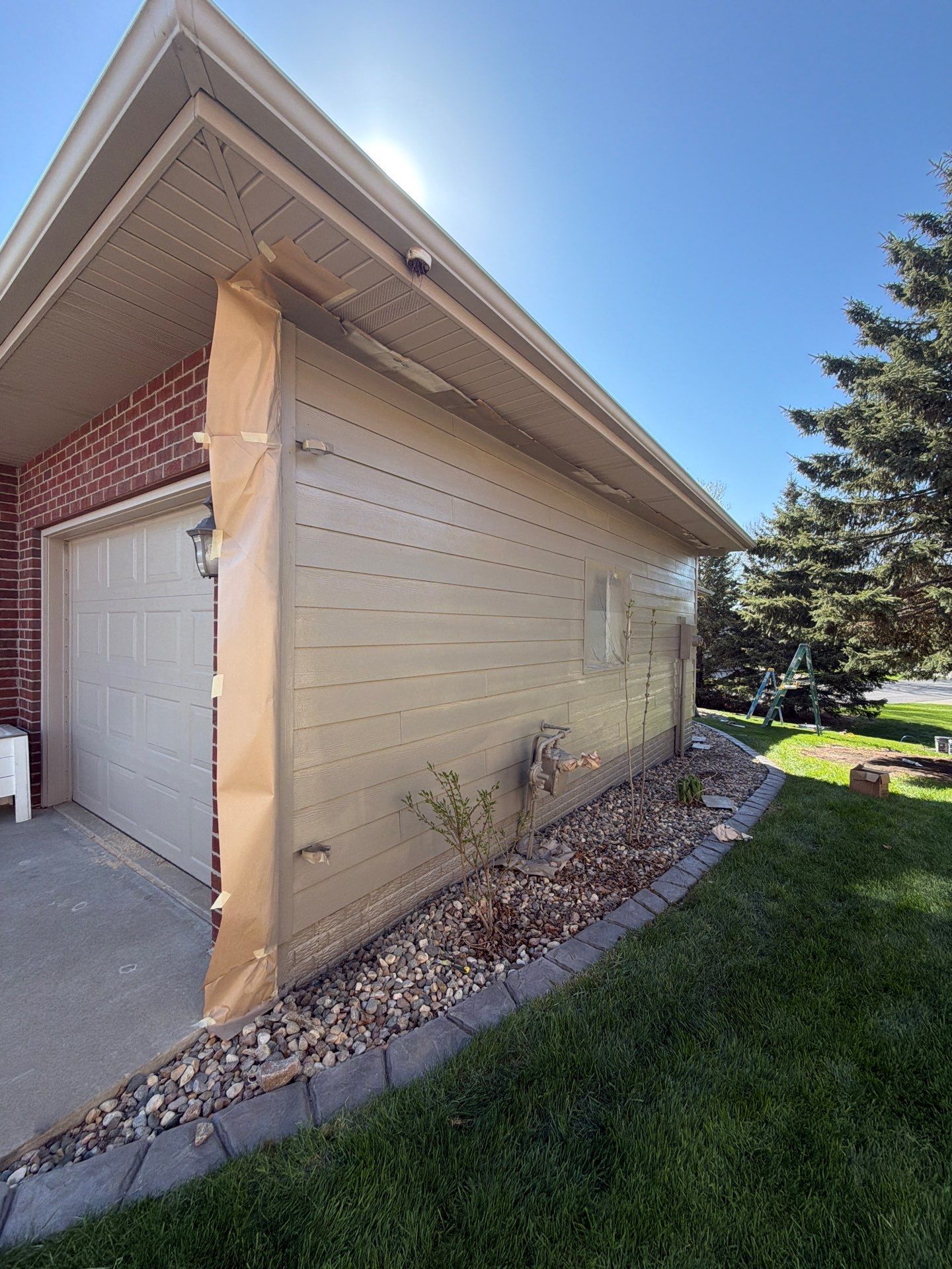 Residential Exterior Siding and Trim Painting in Sioux Falls by Select Painting, Coatings & Garage Cabinets