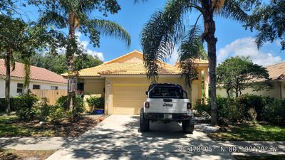 Concrete Tile Roof Repair and Decking Restoration in Delray Beach