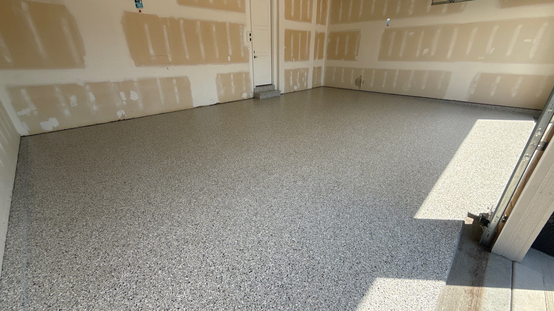 Comprehensive Garage Renovation Featuring Epoxy Flooring by Banner Garage