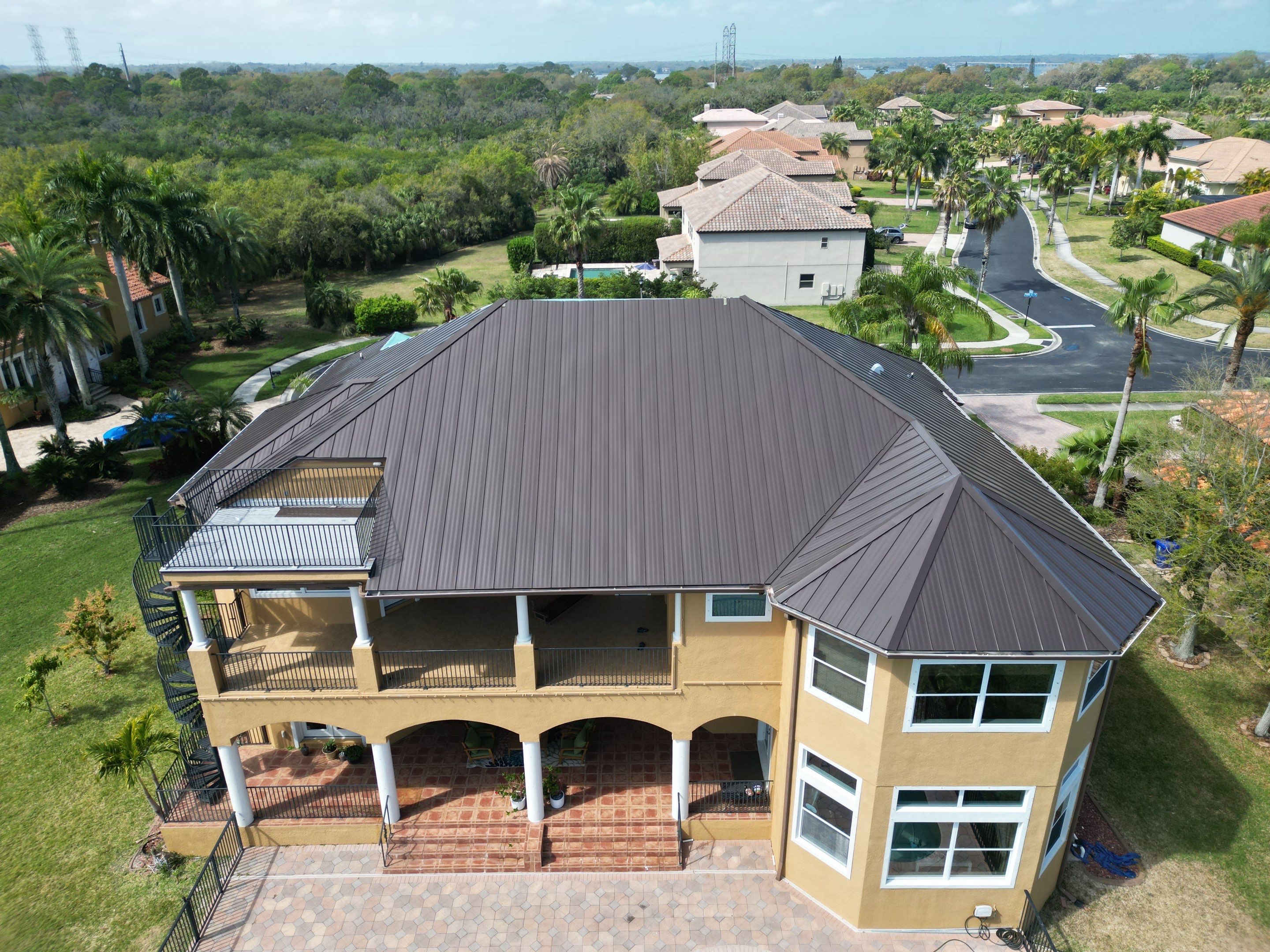 Dark Bronze Standing Seam by Reimagine Roofing