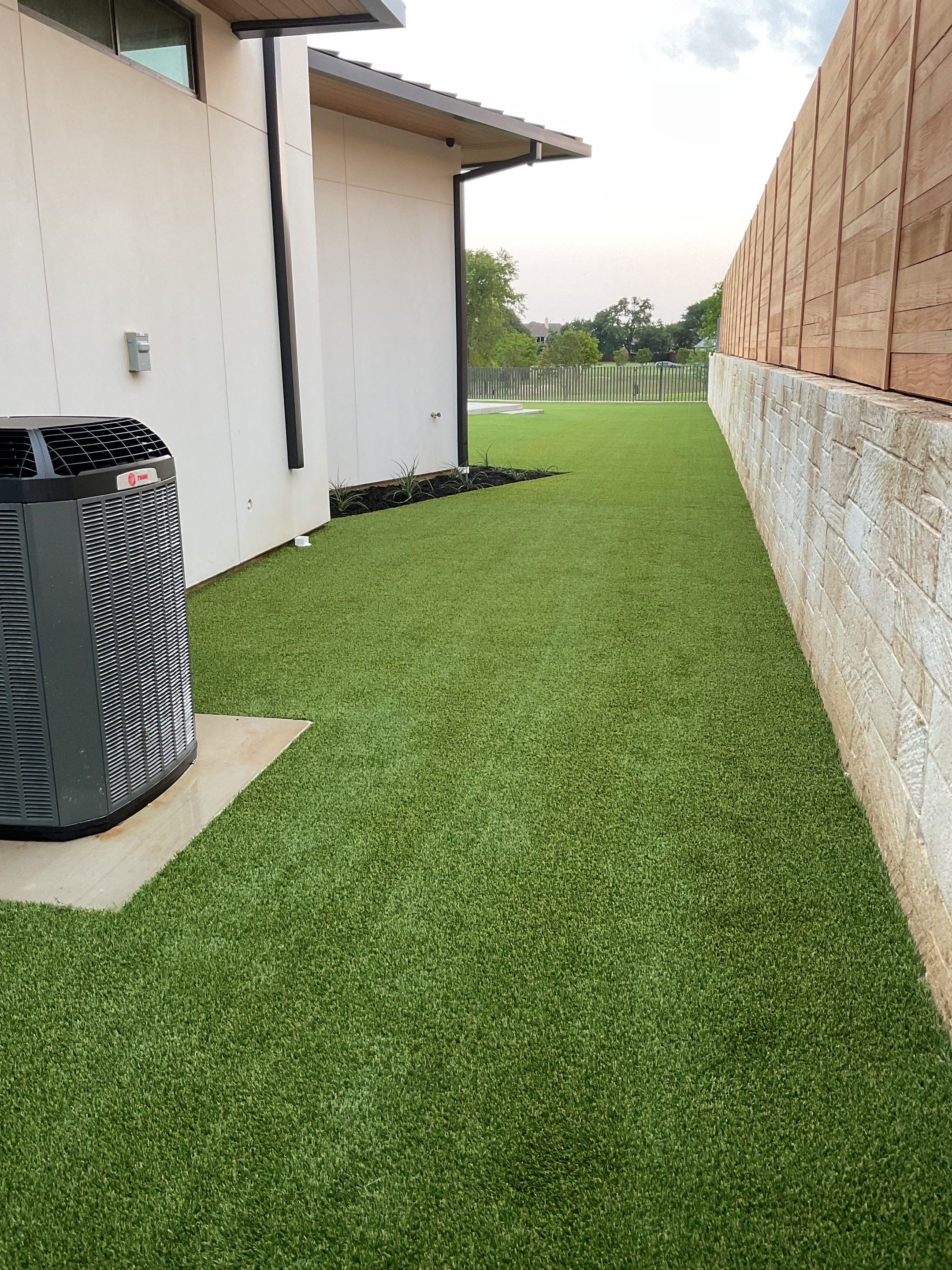 Synthetic Turf Installation using Texas Rye by Turf Concepts