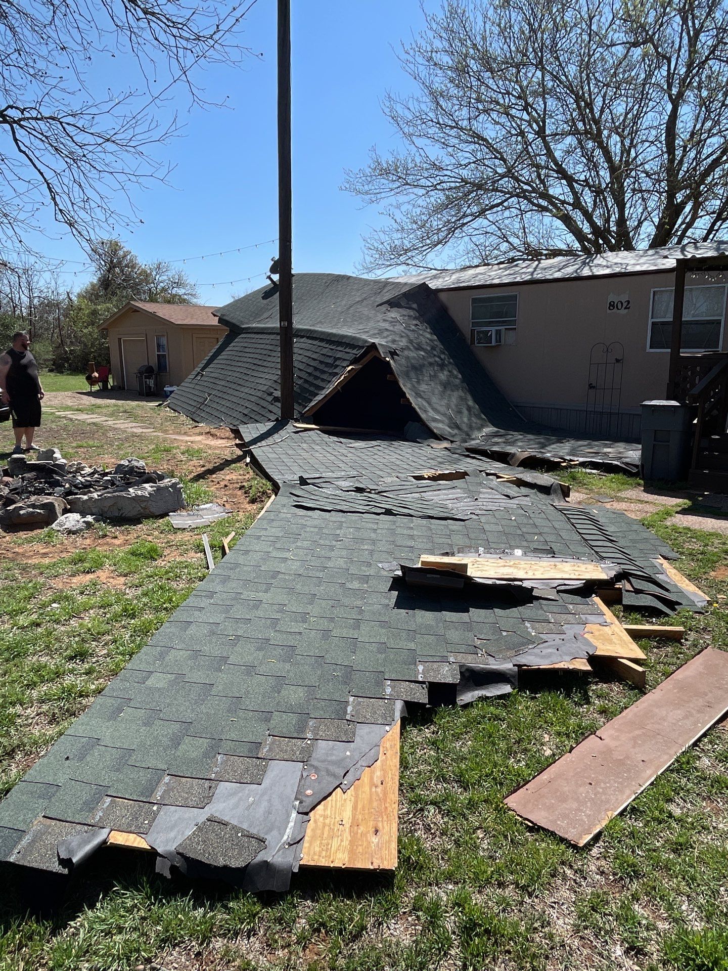 Roof Damage using ATLAS Pinnacle Pristine Shingles by Harvey Roofing & Construction
