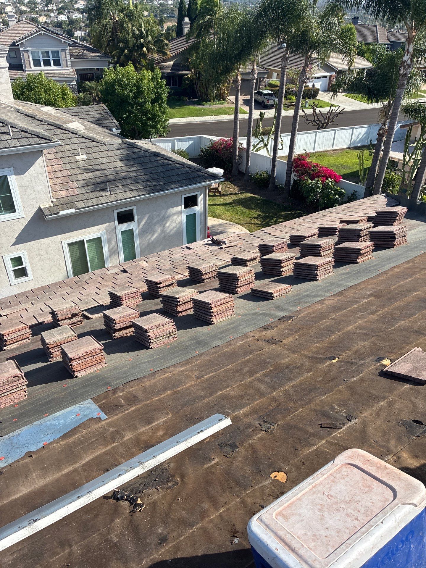 Carlsbad Concrete Tile Roof Replacement with Copper Flashing and Skylights by Reliable Roofing San Diego Inc.