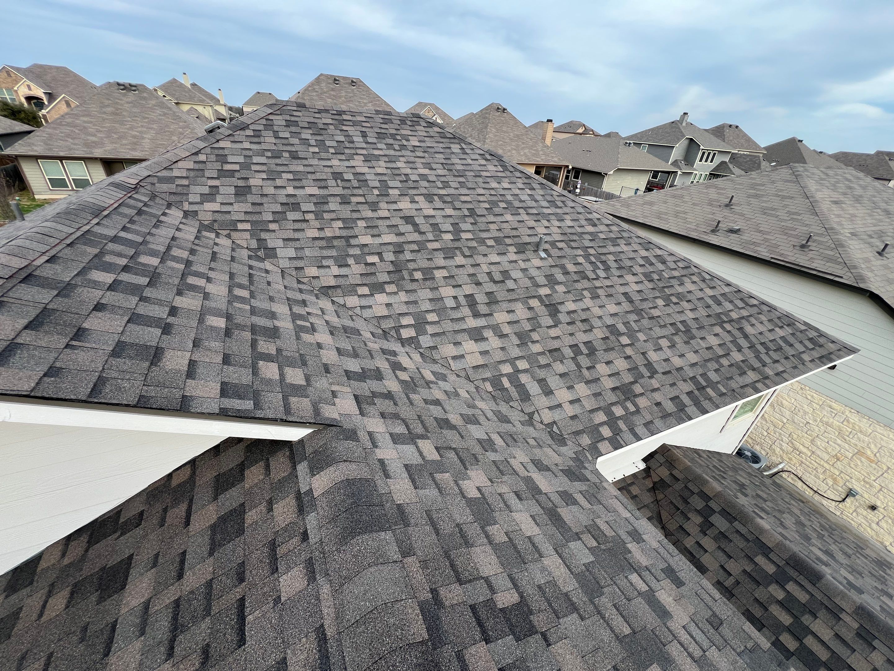 Residential Roofing Installation using IKO Dynasty Class 3 Impact Resistant 30YR Architectural Shingles. Color: Driftshake by WR Roofing Solutions