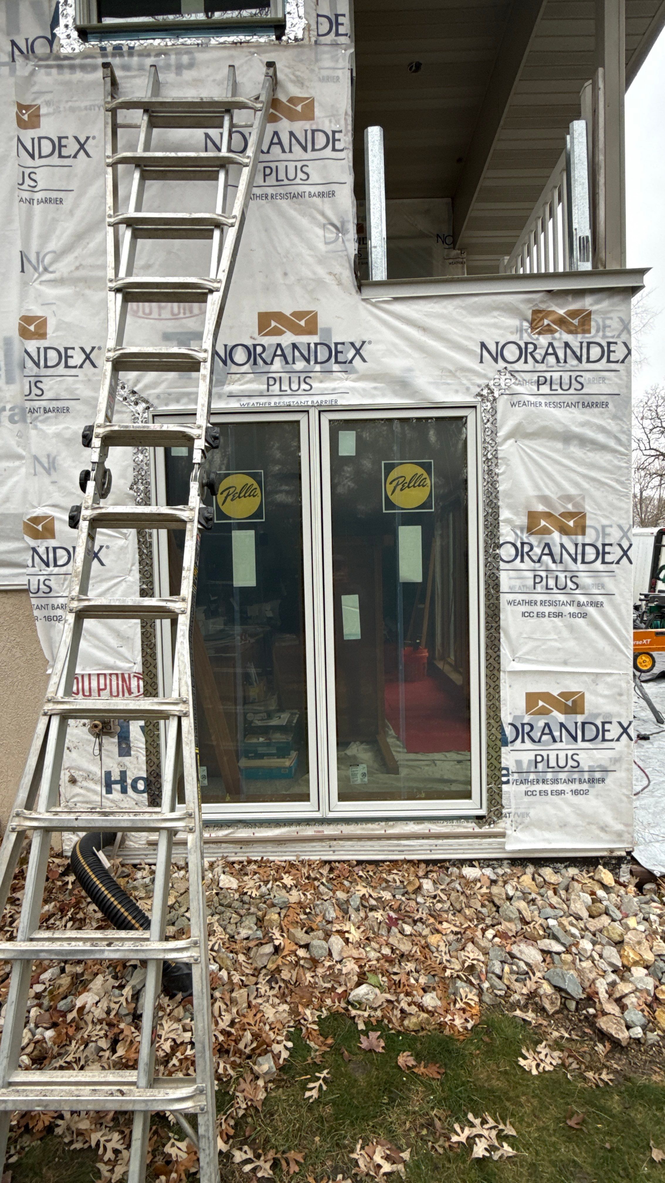 A Clean Window Upgrade Ready for New Siding with Pella Lifestyle Series by United Windows and Siding LLC