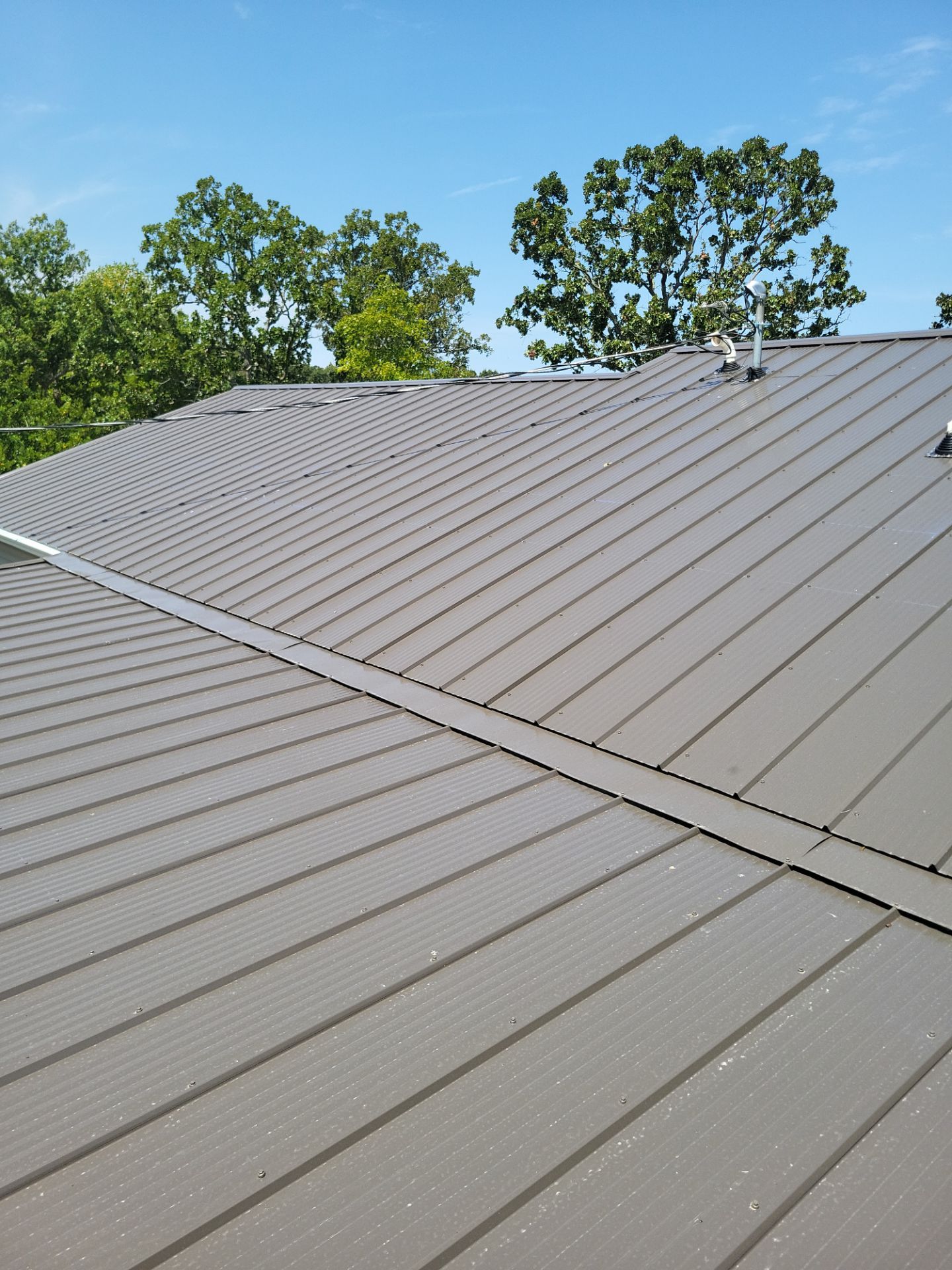 Residential Roof + Gutters & Downspouts & Gutter Covers Install  by Titan Commercial & Residential Roofing 