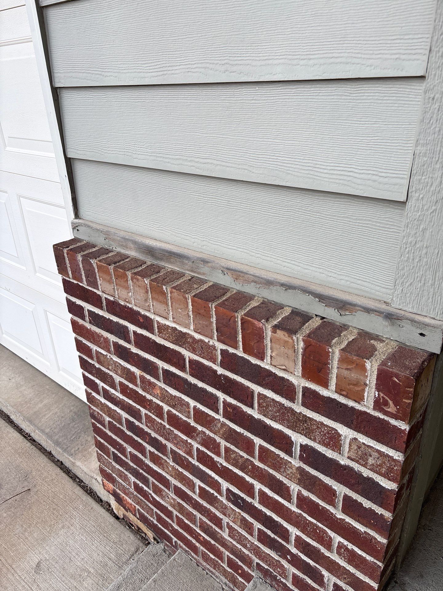 Full Exterior Residential Painting and Siding Refresh in Sioux Falls by Select Painting, Coatings & Garage Cabinets