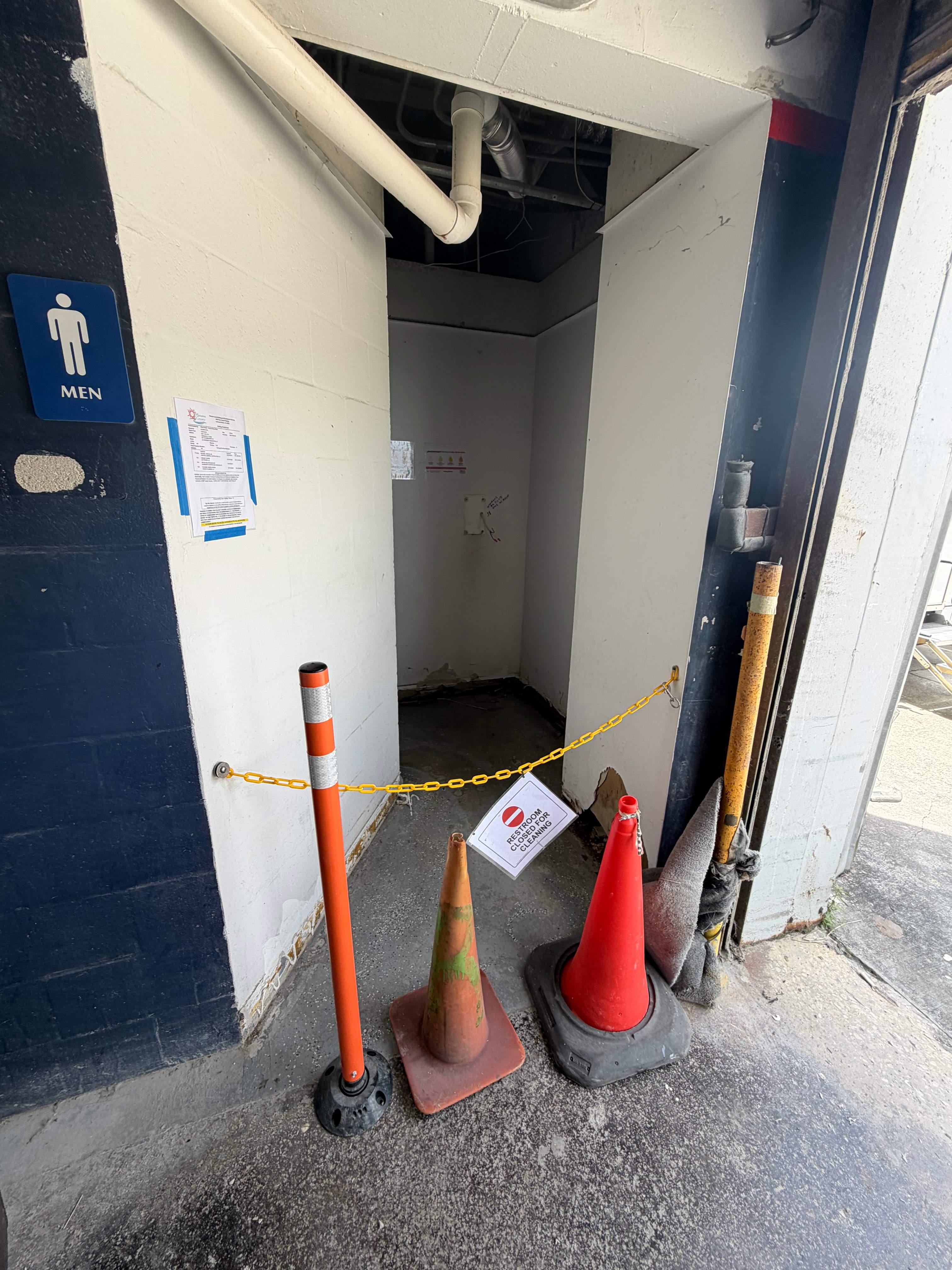 Commercial Restroom Renovation with Epoxy Flooring in Sarasota by Vertical General Contracting 