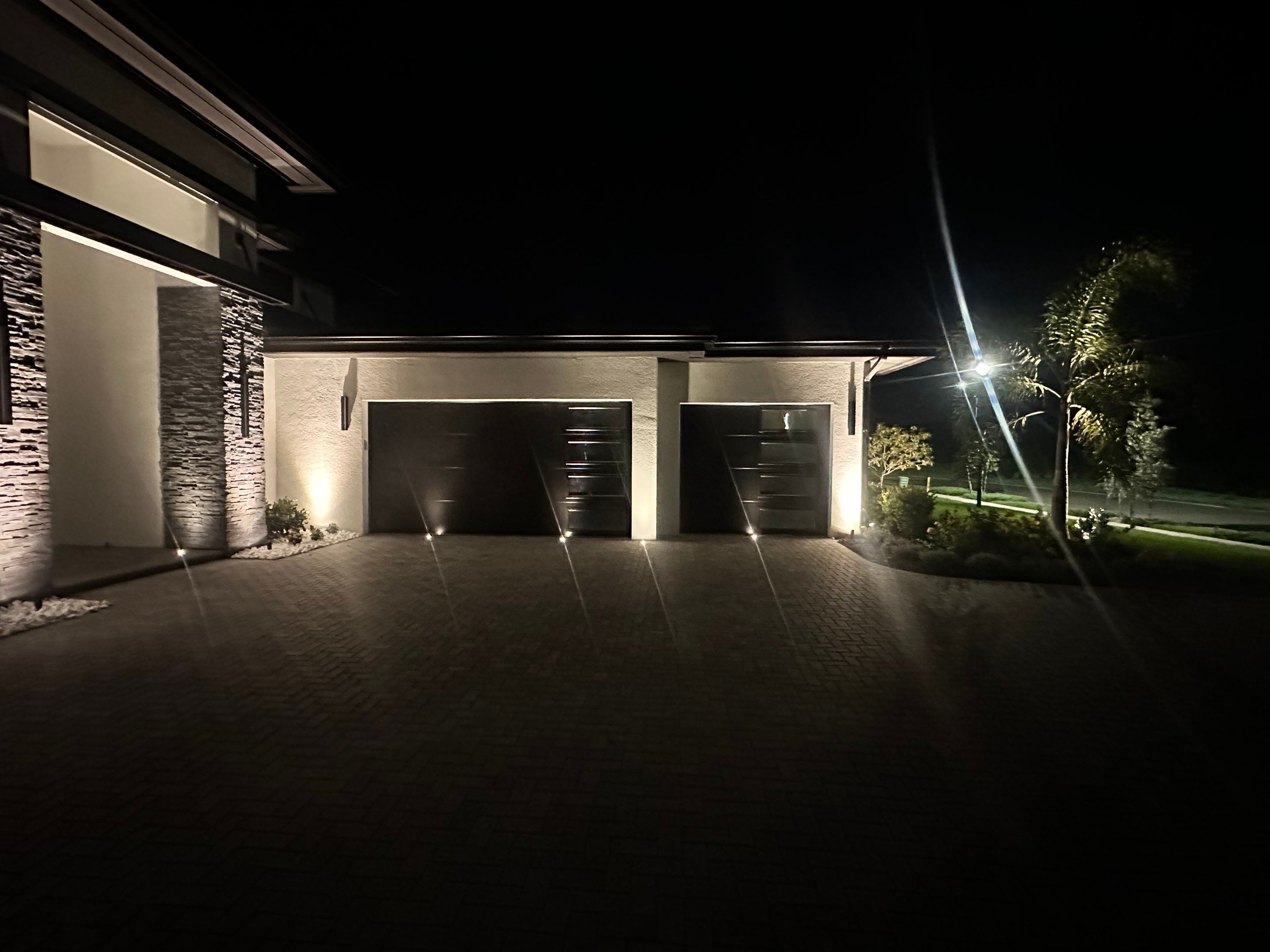 Modern Architectural and Landscape Lighting Installation in Sarasota by Illuminate Landscape Designs