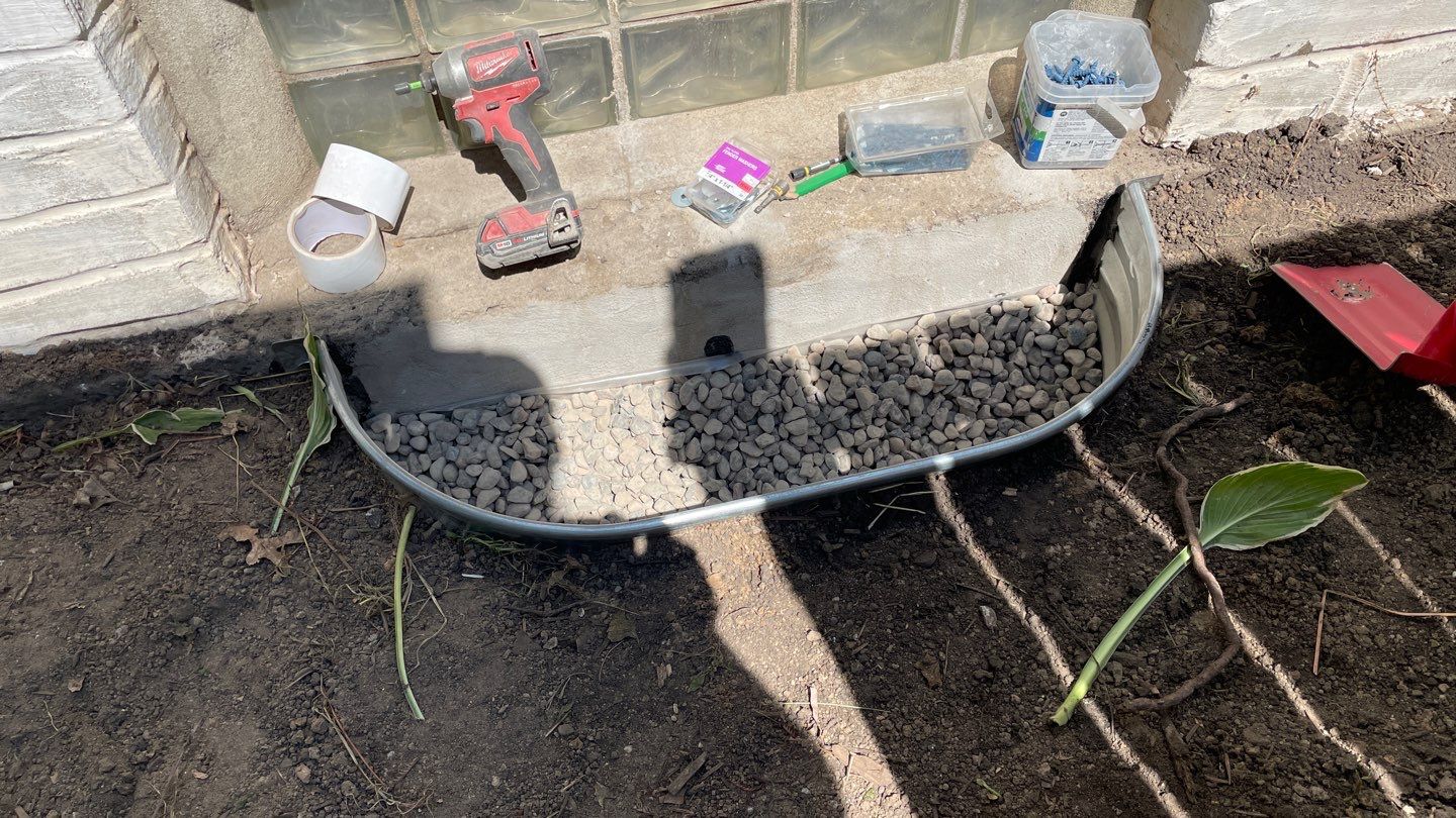 Drain Tile, Window Wells & Buried Discharge in Minneapolis by Waterproofing Northeast
