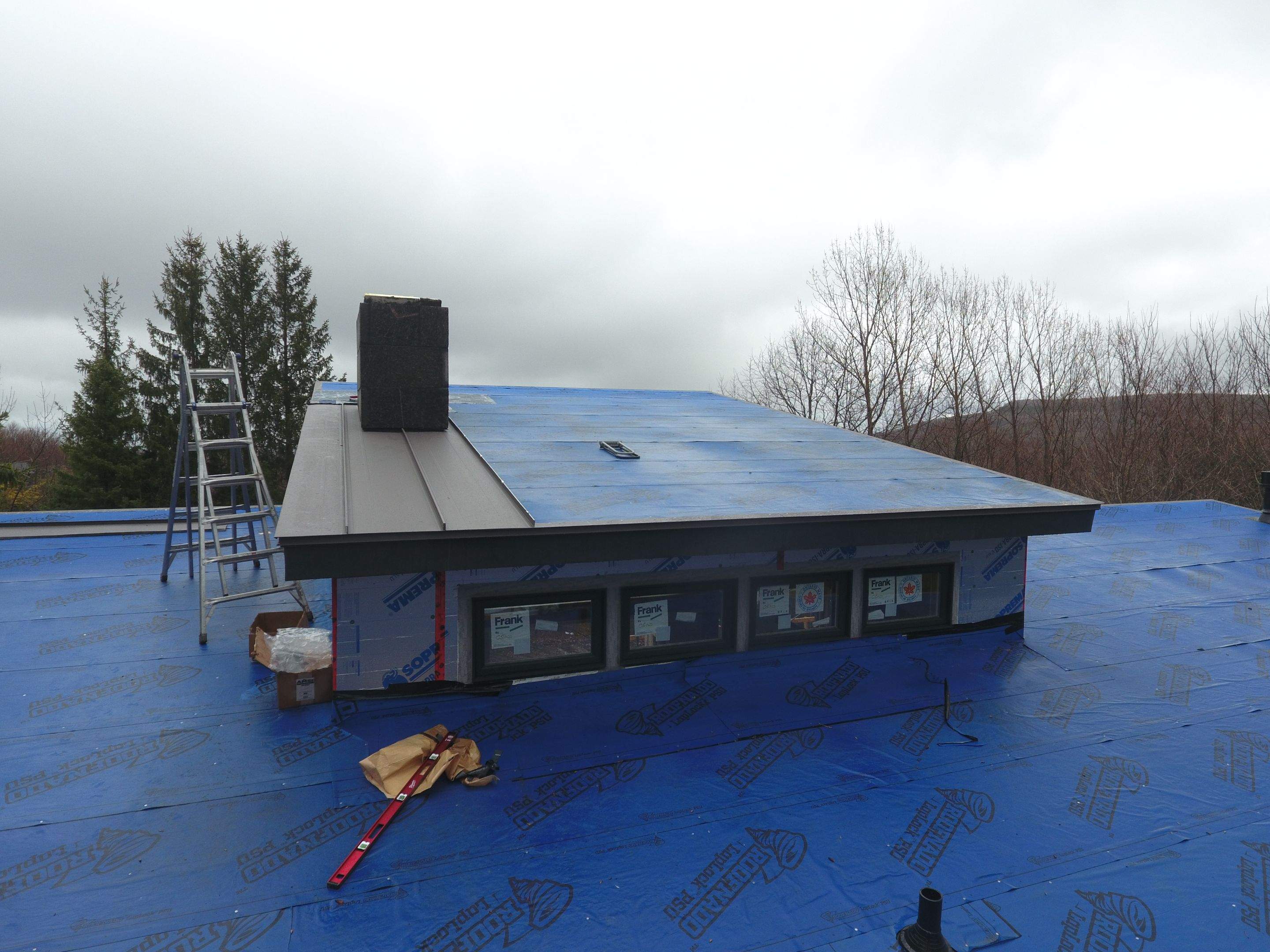 Residential Roofing Installation using 24 Ga Standing Seam Metal by Jay Carter Roofing & Sheet Metal