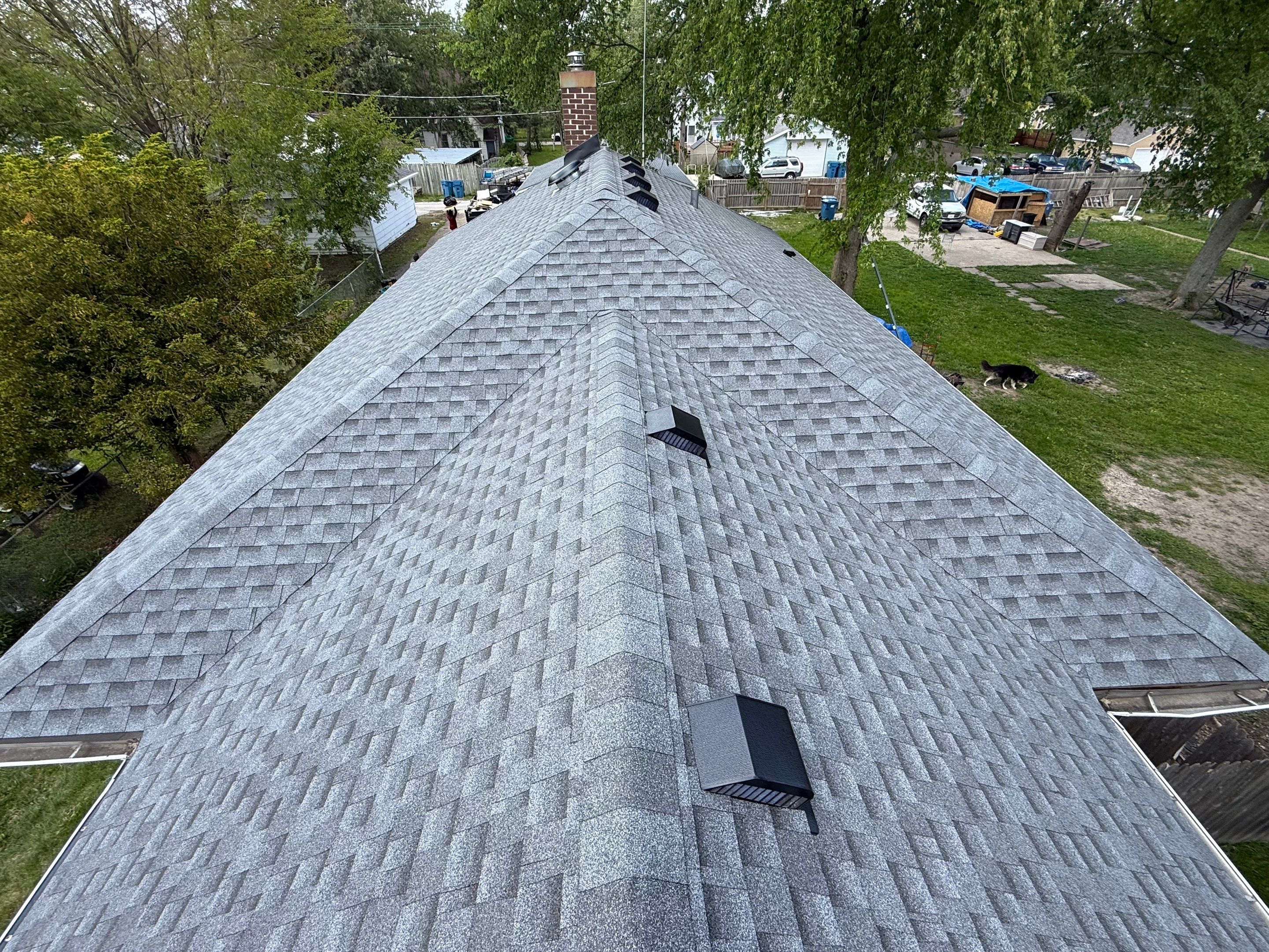 Roof replacement by Optimal Home Improvement 