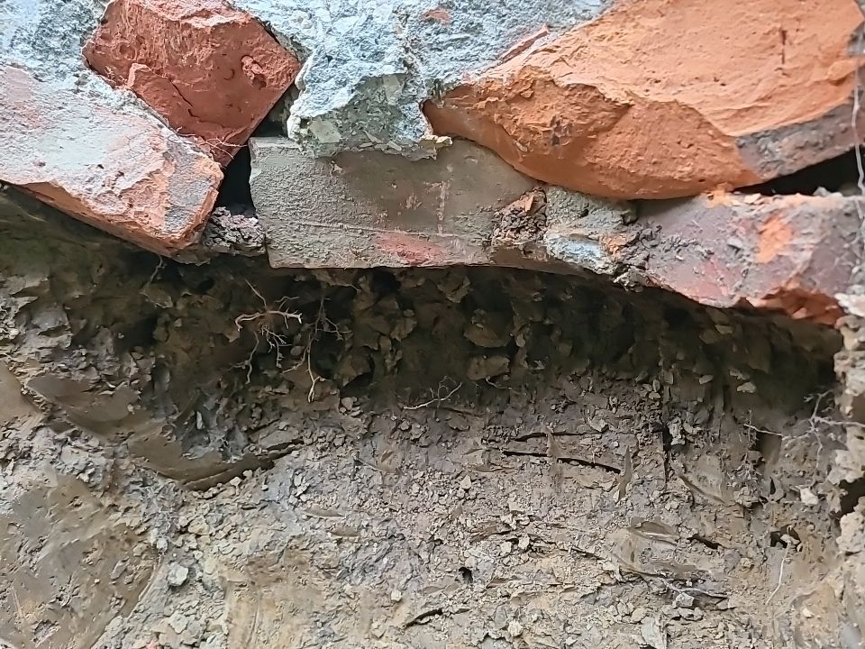 Lifting Home With Piers using Magnum Piers by Toledo Basement Repair