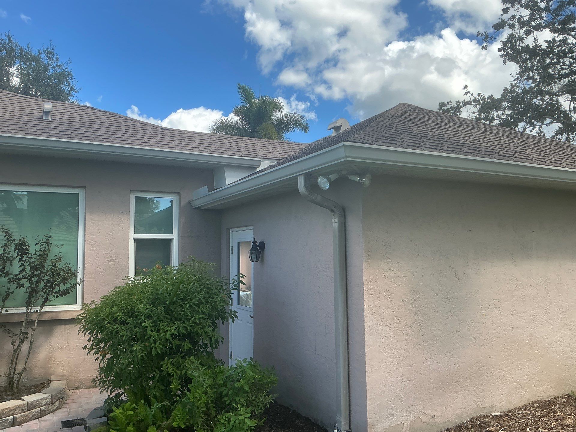White 6-Inch Seamless Gutters in Sarasota FL by Gutter Professor by Gutter Professors