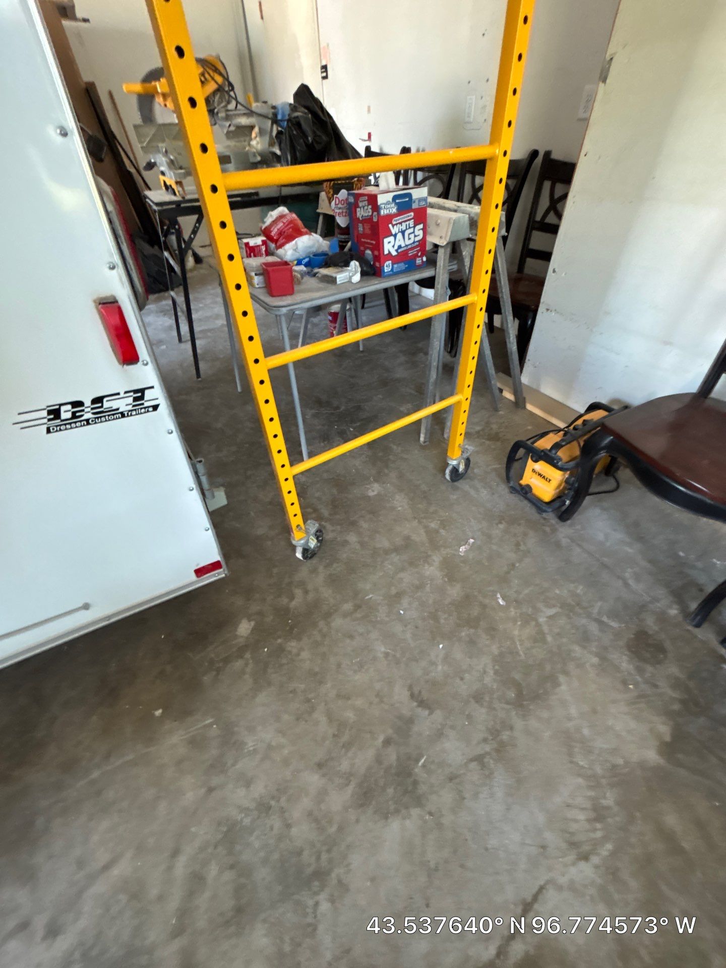 Coyote Flake Concrete Coating for Sioux Falls Garage by Select Painting, Coatings & Garage Cabinets