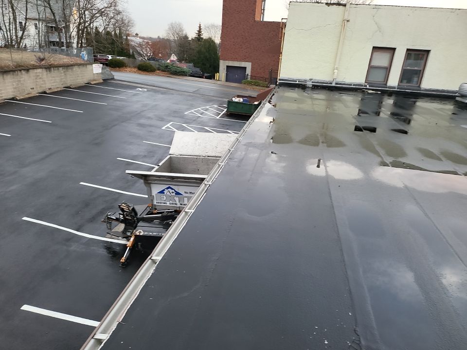 Commercial Roofing Installation using EPDM  by A Plus Exterior