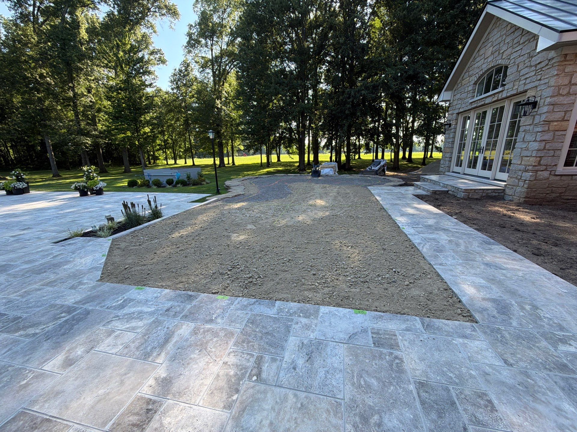 Custom Backyard Golf Green Accented by Flagstone Border in Morrow, OH by Southwest Greens Midwest