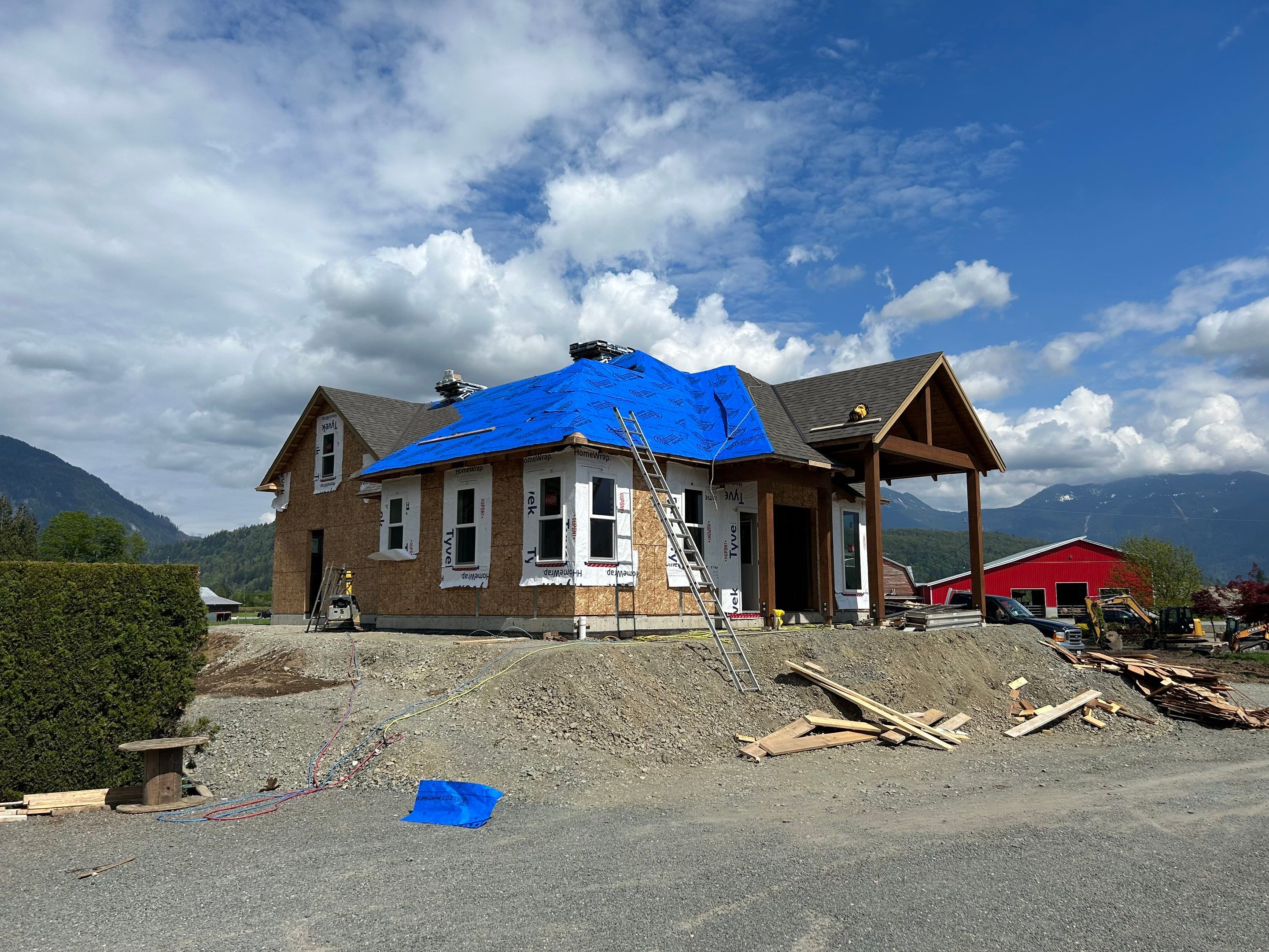 Residential Roofing Installation upgraded venting and hip and ridge capping by Top Notch Roofing Inc
