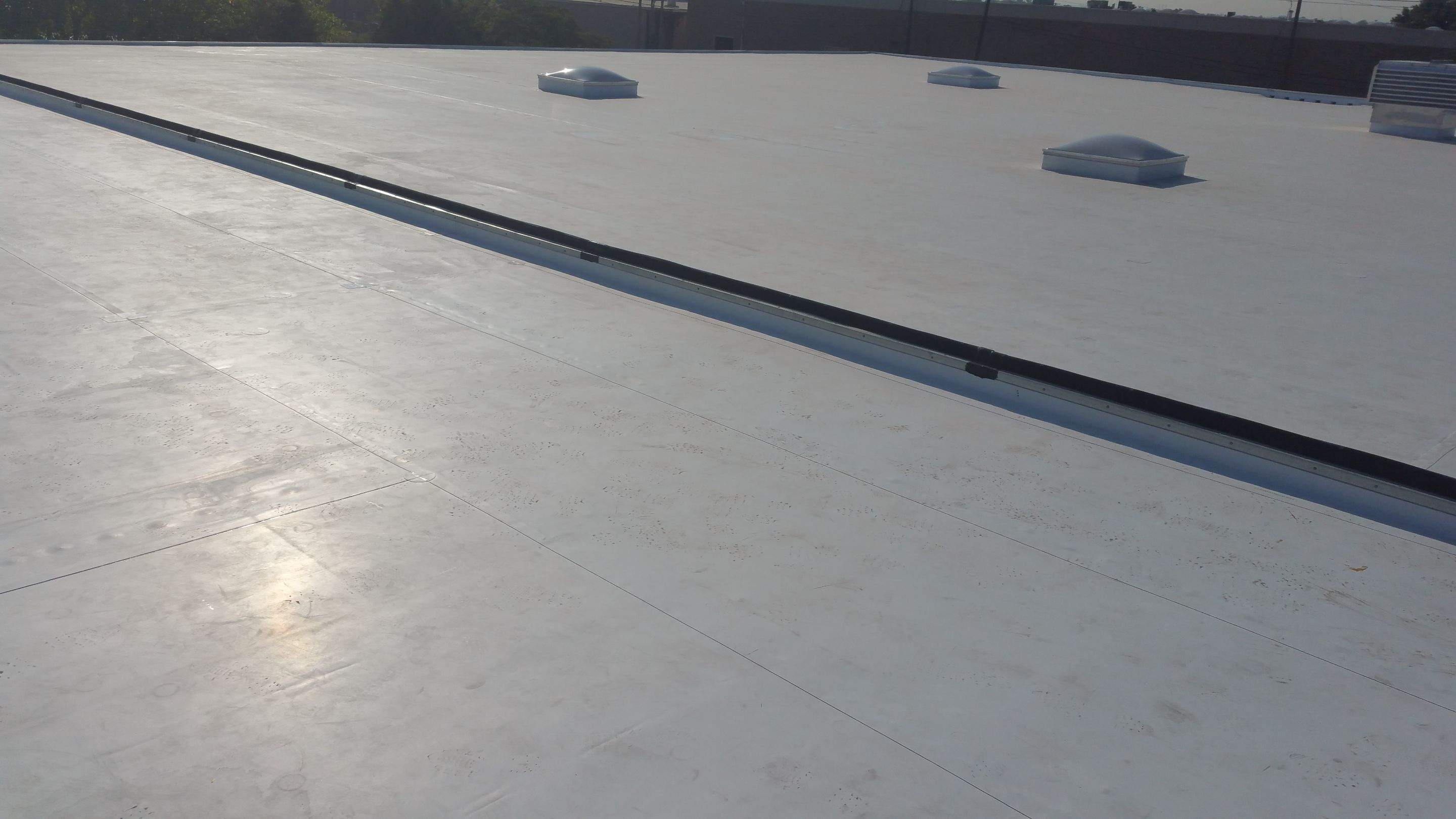Massive Storm Damage Project - Factory in Arlington by First United Roofing & Construction